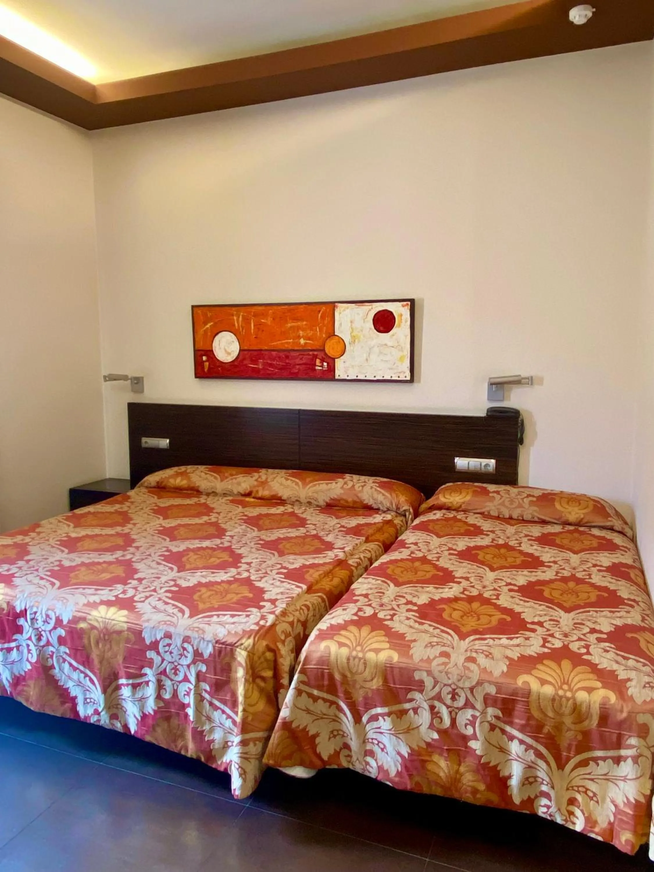 Bed in Hospedium Hotel Los Periquitos