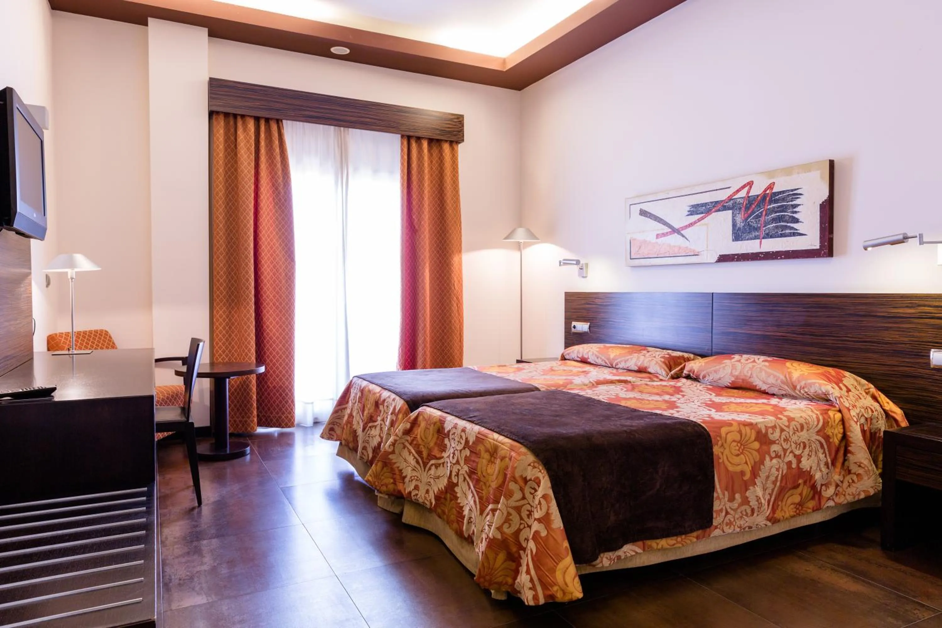 Bed in Hospedium Hotel Los Periquitos