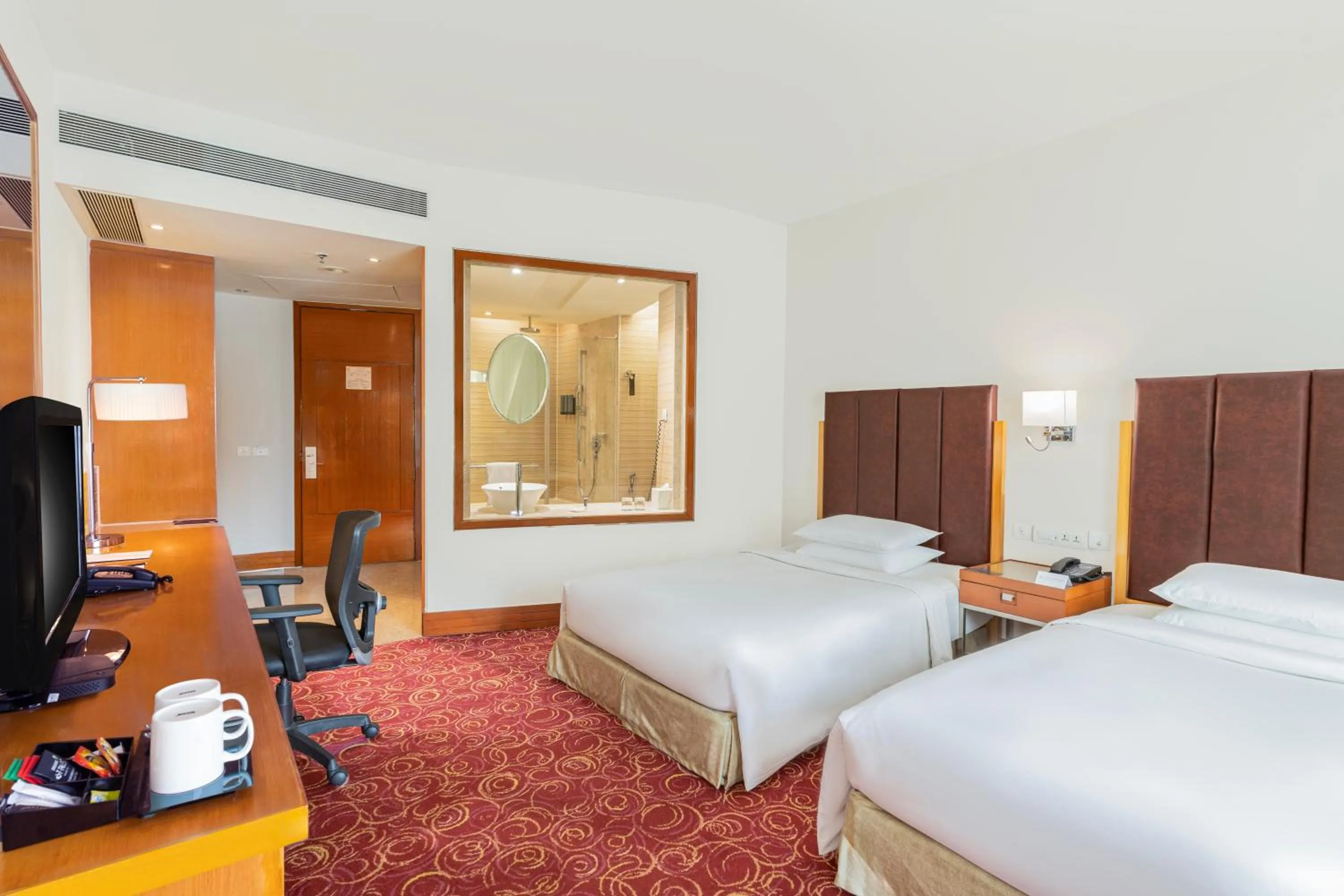 Bedroom, Bed in Courtyard by Marriott Hyderabad