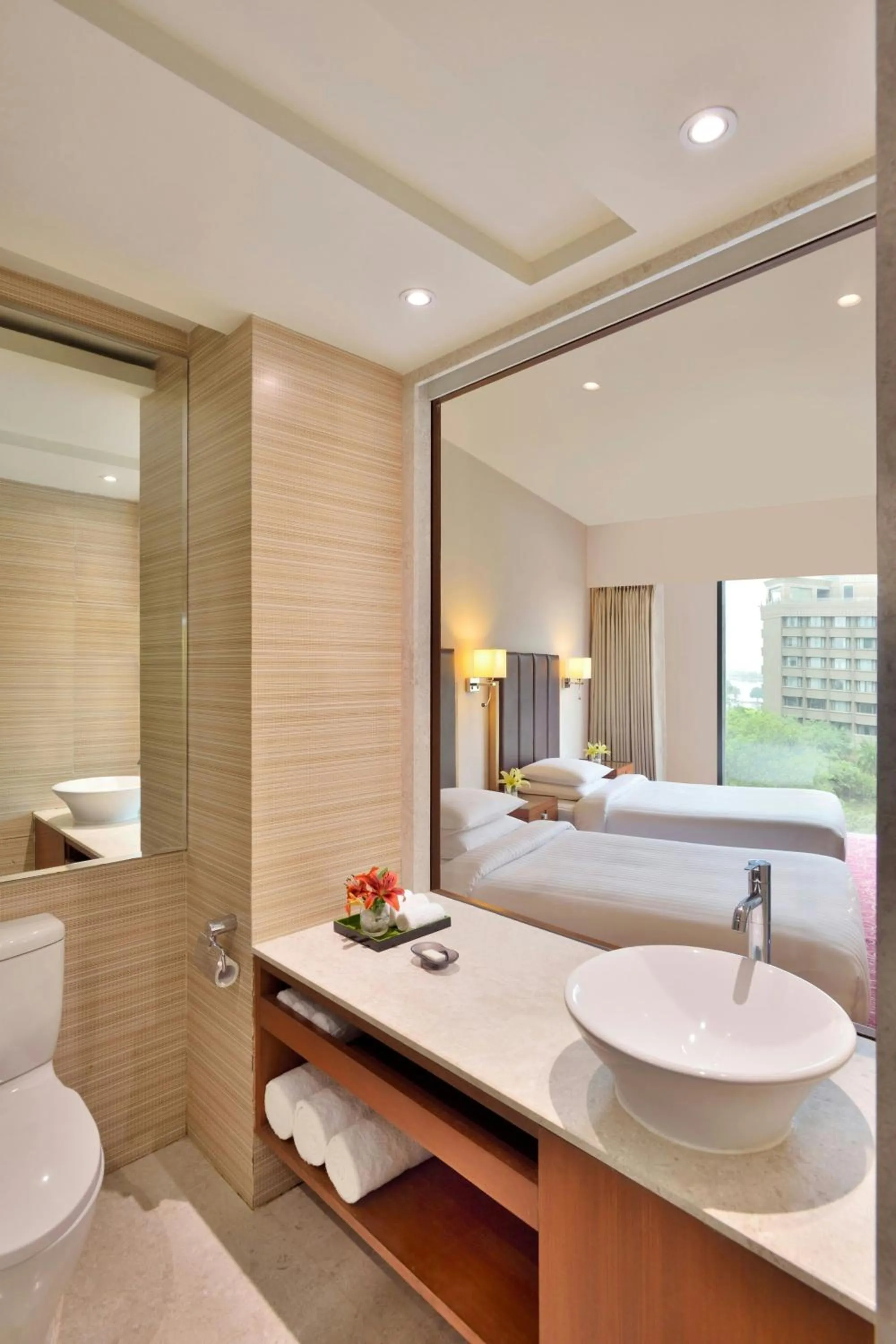 Bathroom, Bed in Courtyard by Marriott Hyderabad