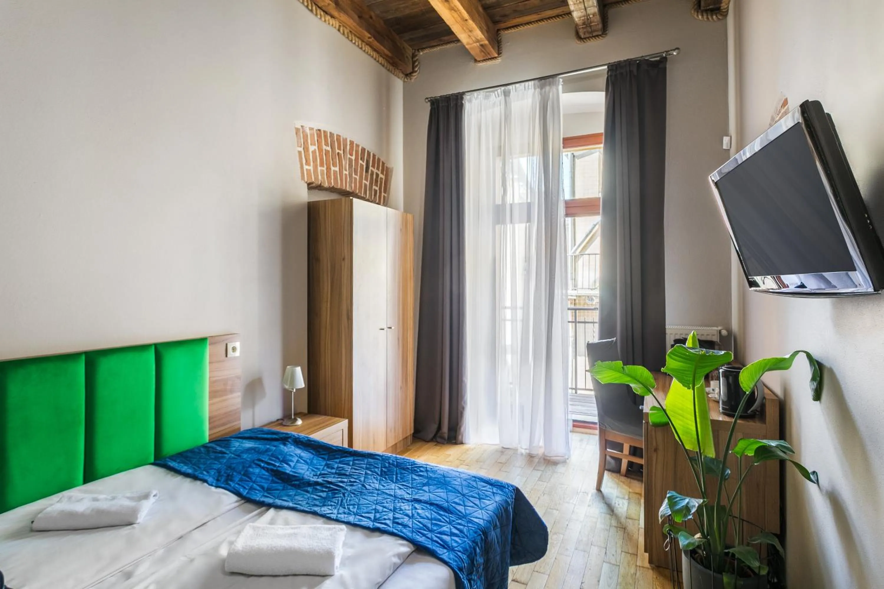 Bed in Aparthotel Pergamin