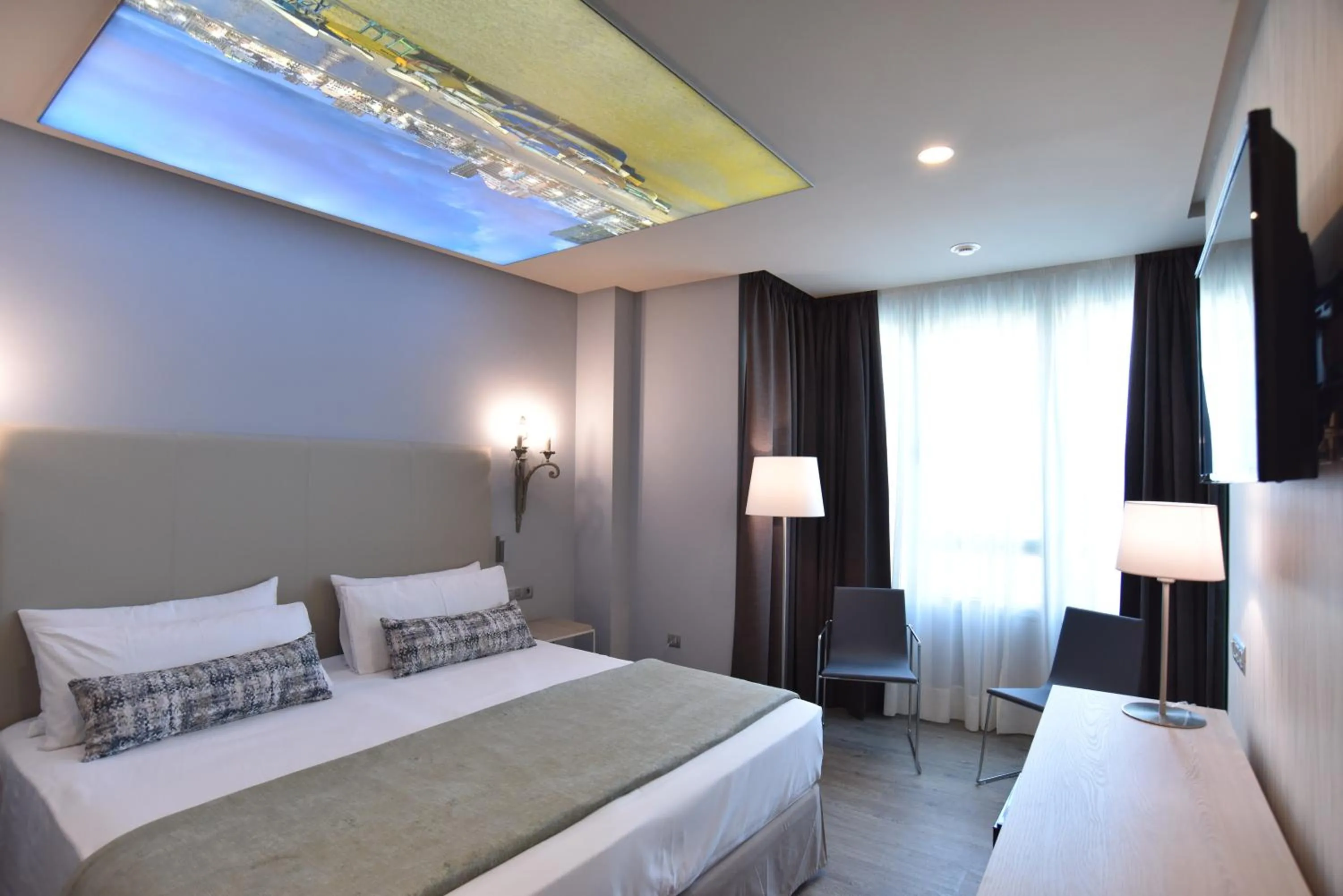 Bed in TC Hotel Doña Luisa