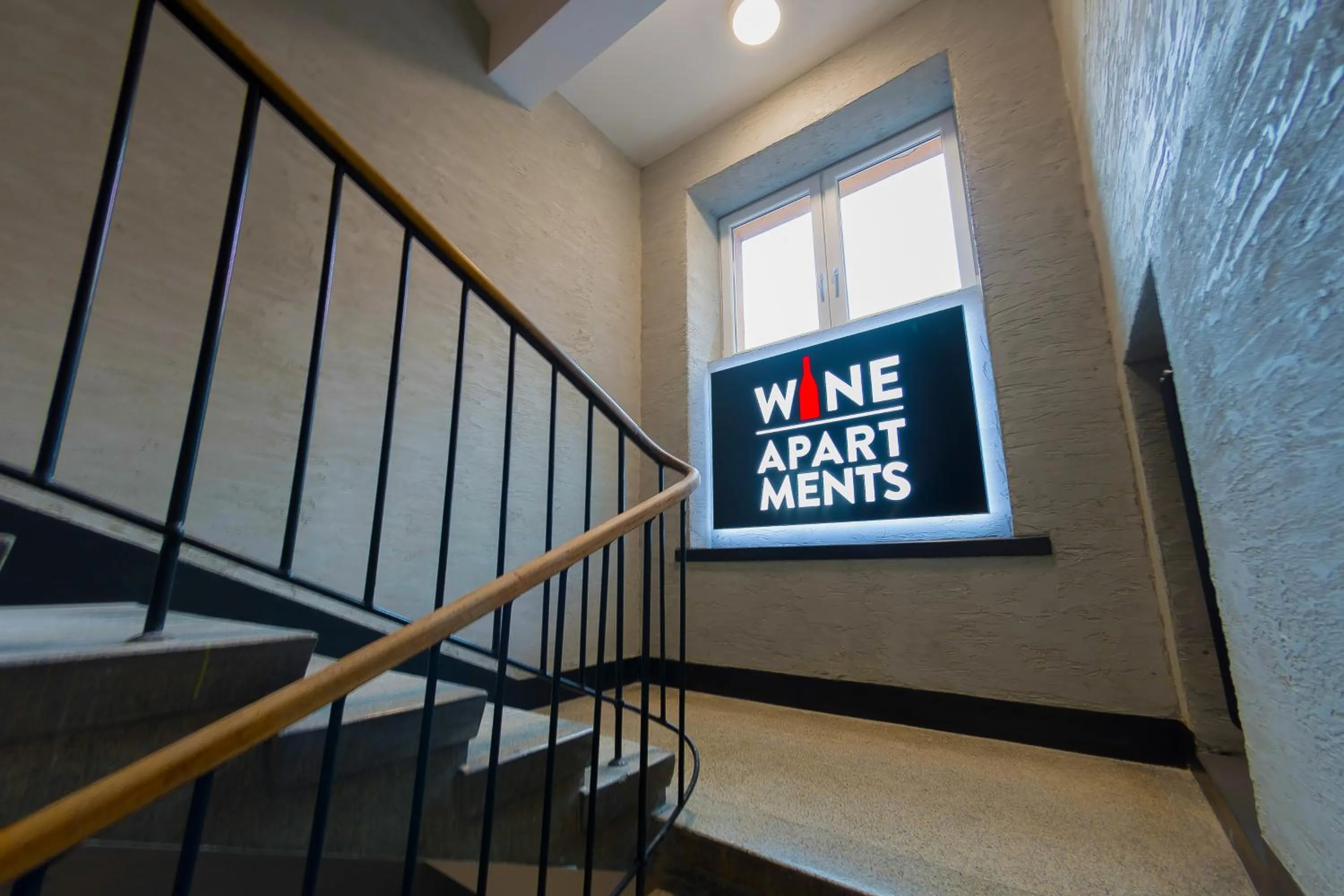 Property logo or sign in Wine Apartments