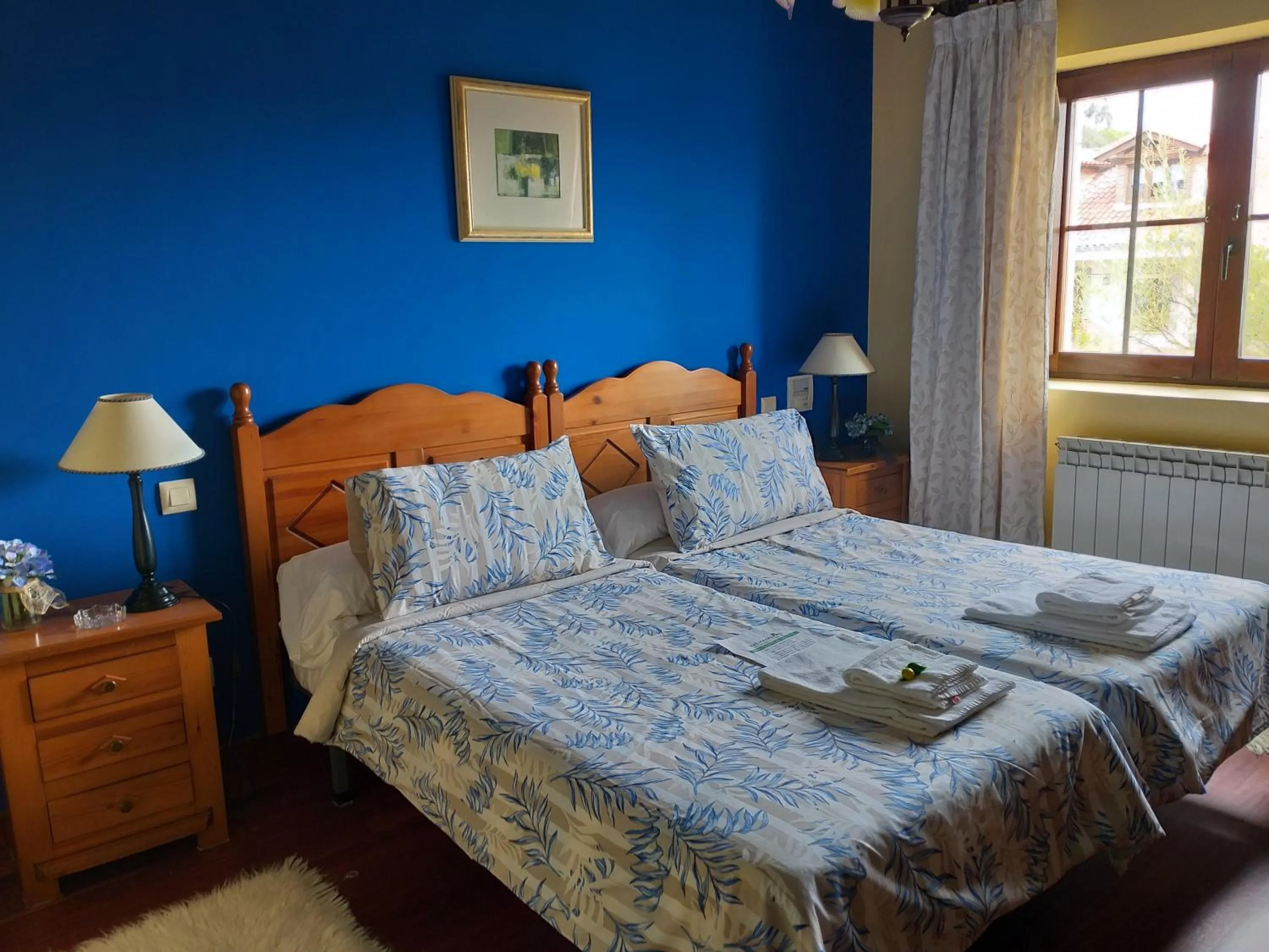 Bed in Posada Rural Entrecomillas