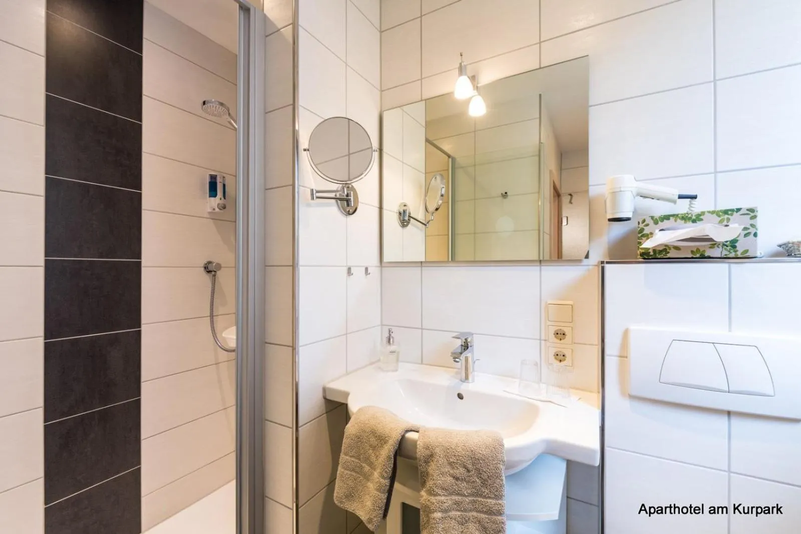 Shower in Aparthotel am Kurpark