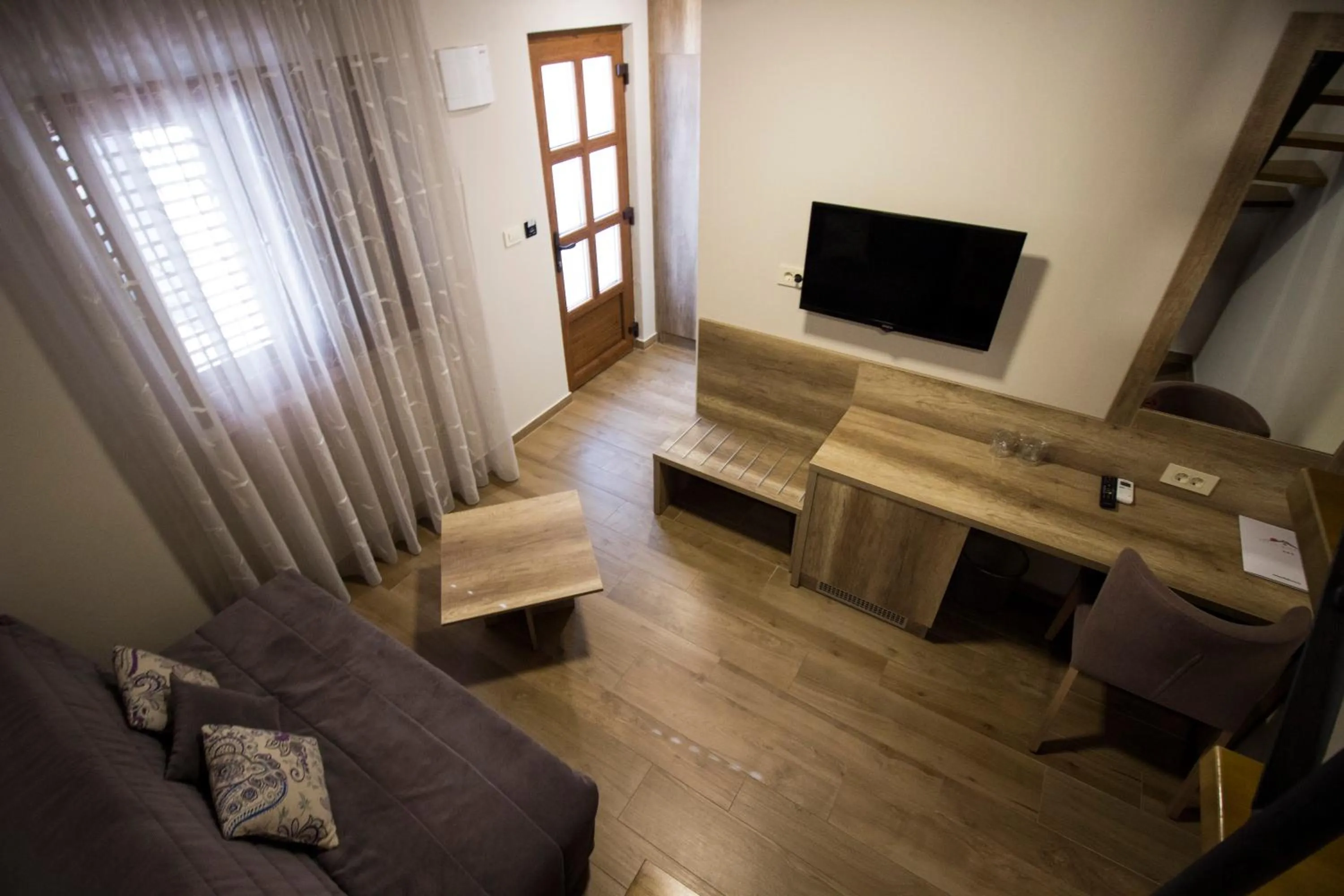 Communal lounge/ TV room in Villa Divani