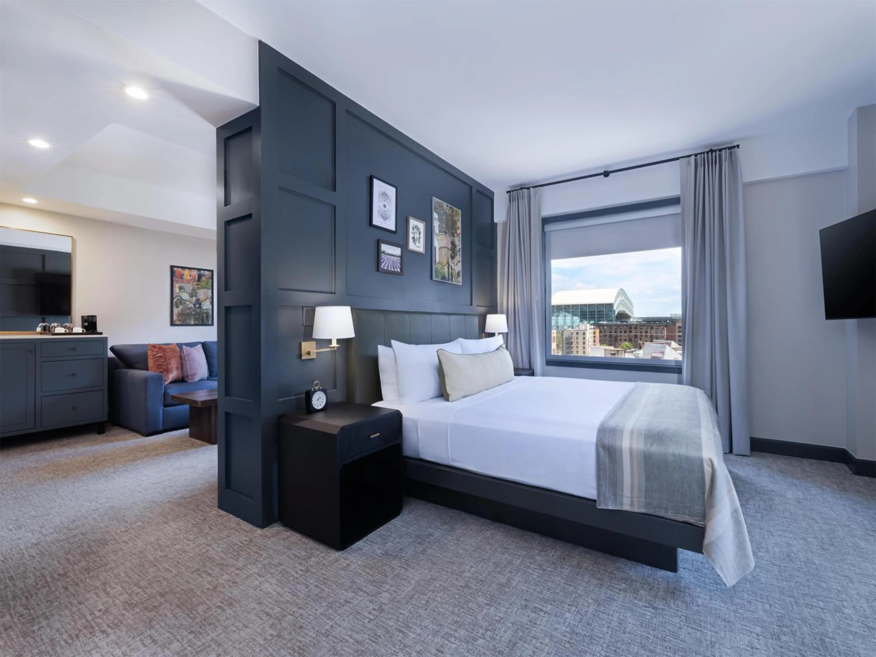 Bed in The Sam Houston Hotel, Curio Collection by Hilton