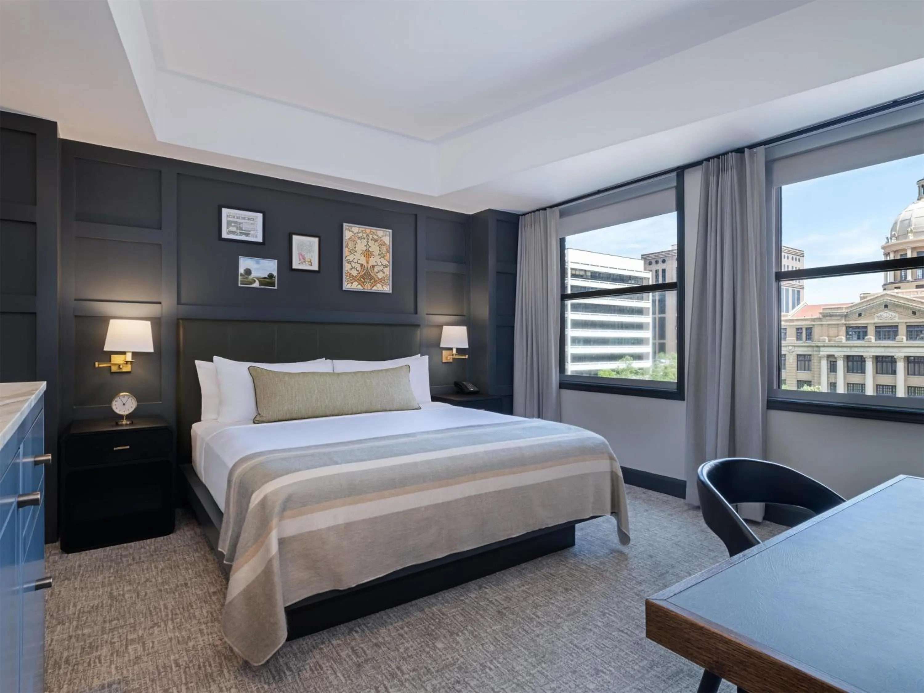 Bed in The Sam Houston Hotel, Curio Collection by Hilton