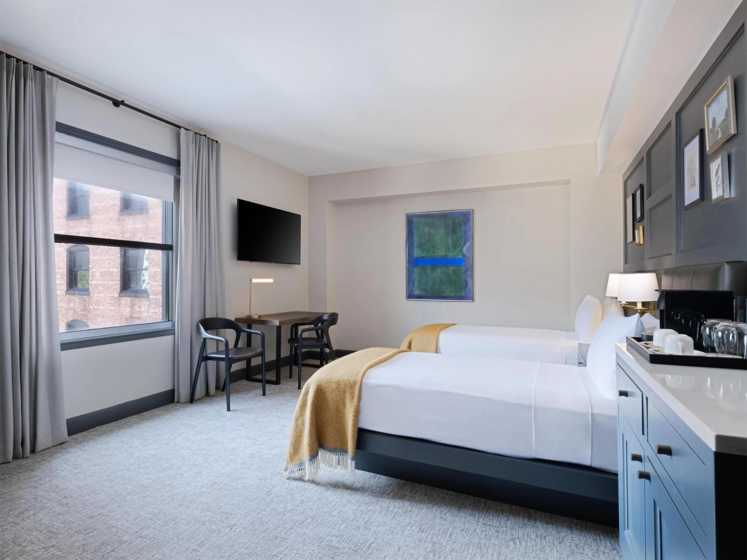 Bed in The Sam Houston Hotel, Curio Collection by Hilton