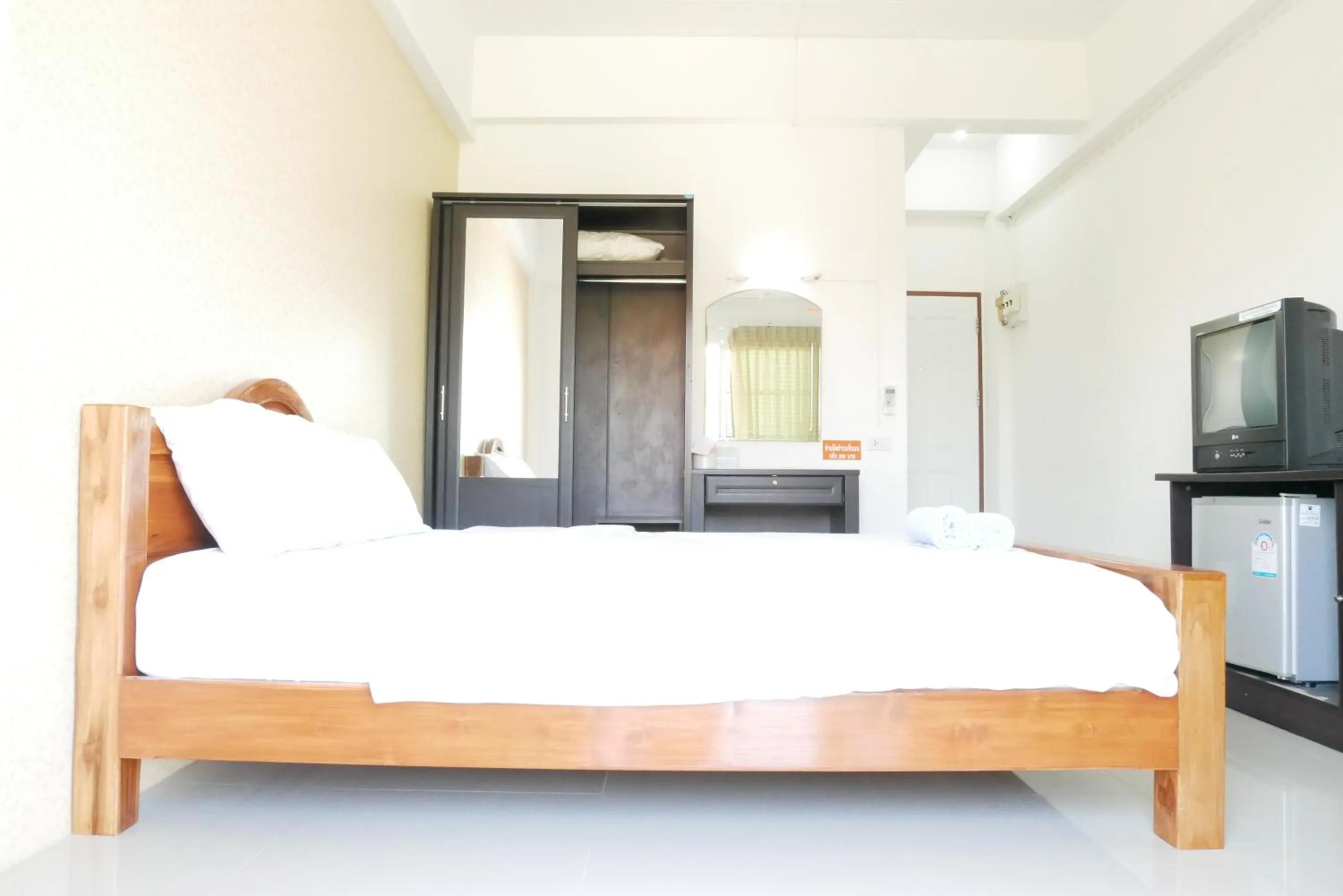 Bed in Fang Villa Hotel