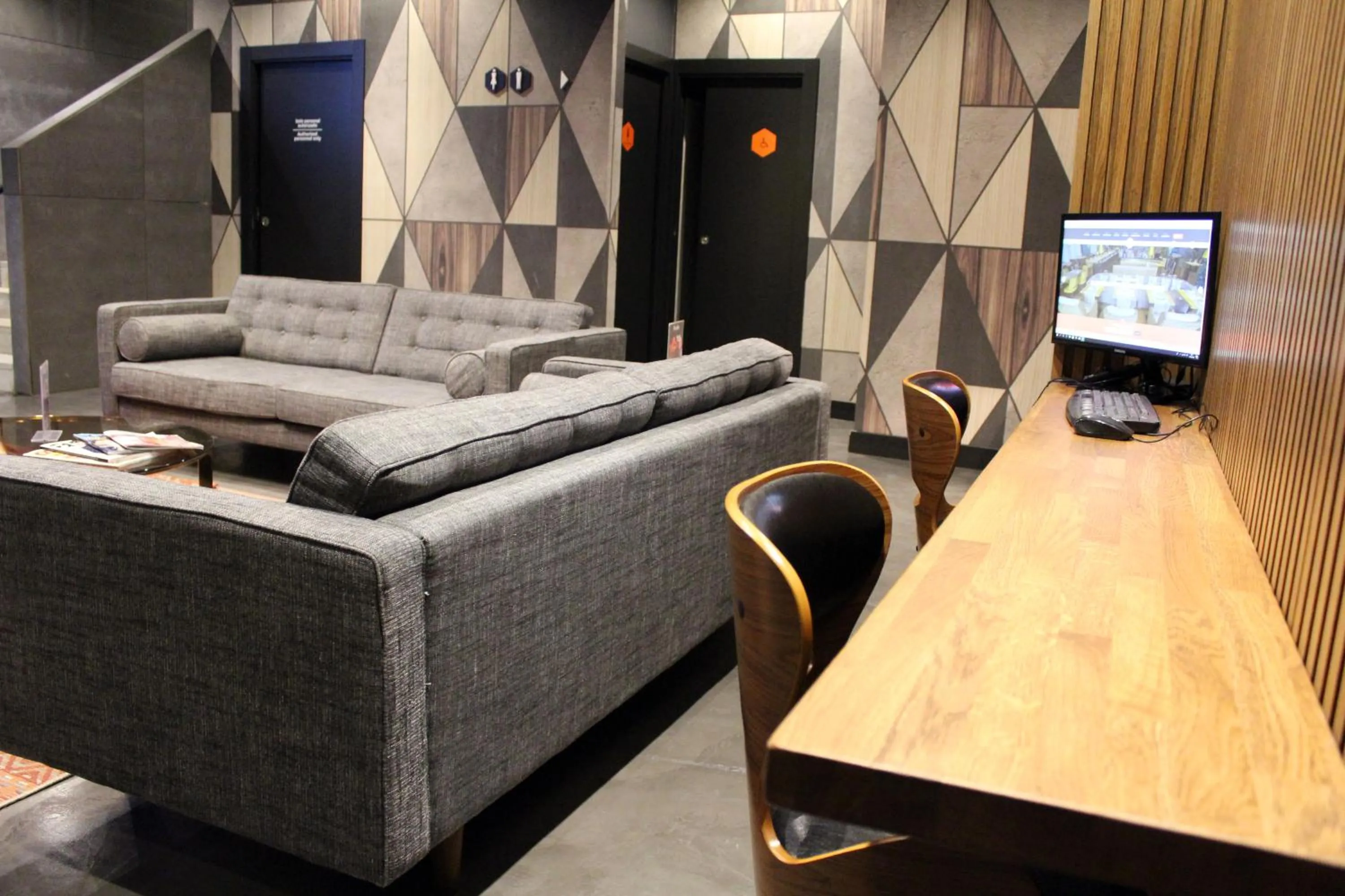 Communal lounge/ TV room in Málaga Premium Hotel