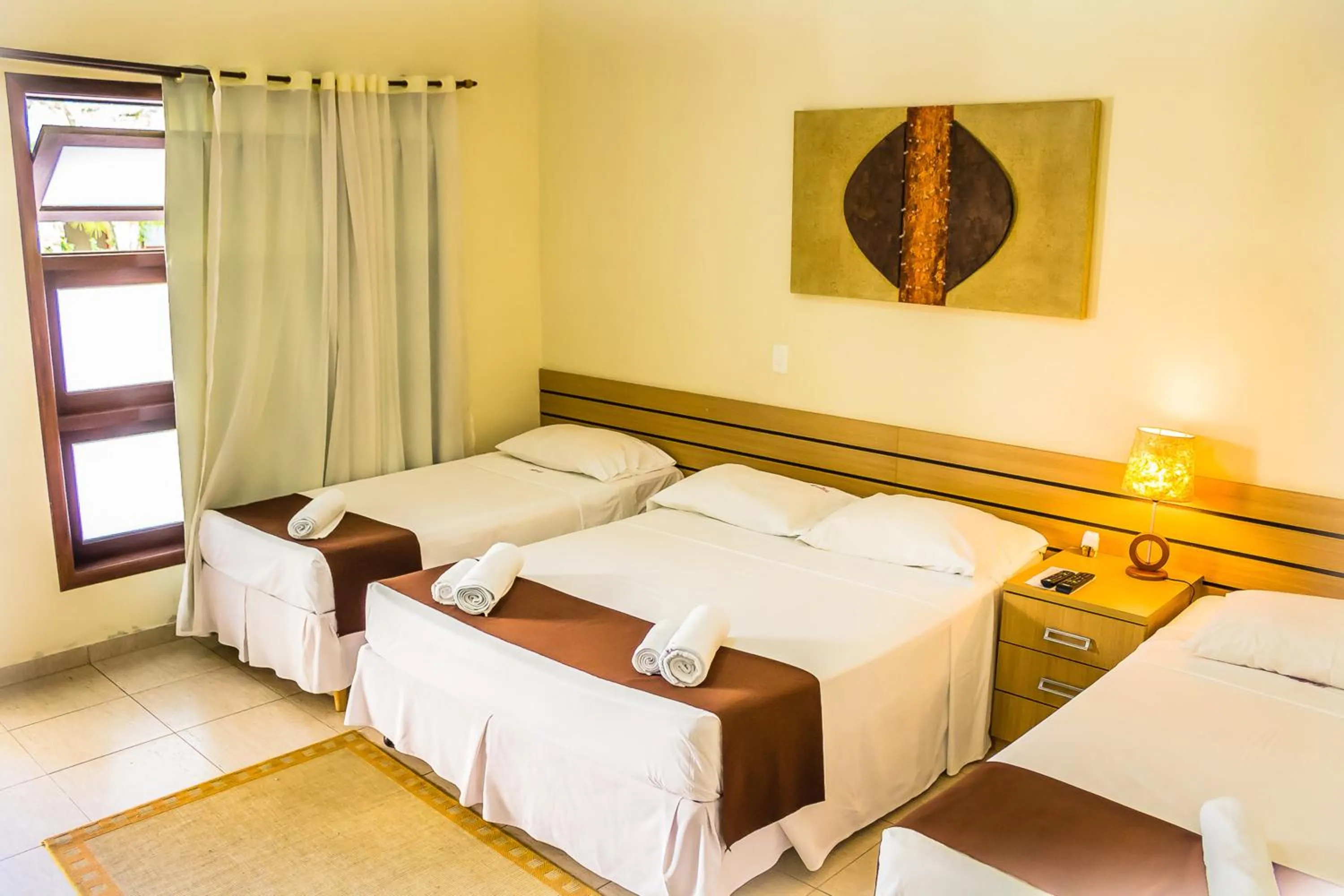 Bed in Pousada L'essence