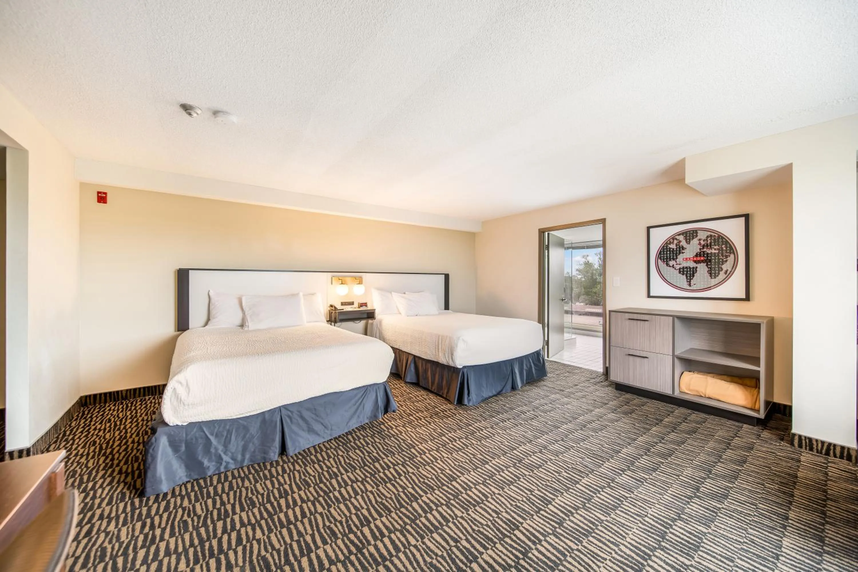 Bed in Ramada Plaza by Wyndham Niagara Falls