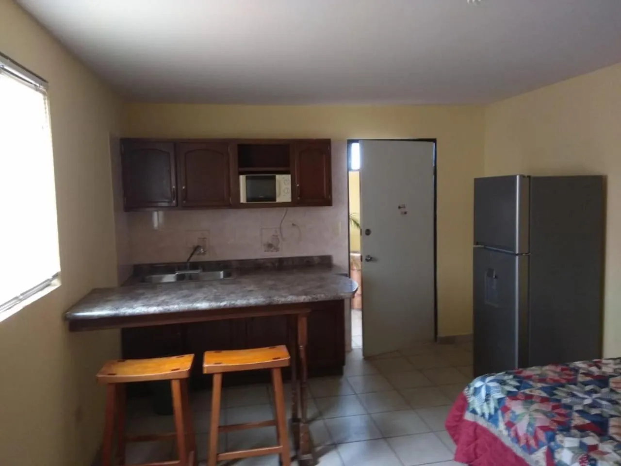 Kitchen or kitchenette in El Ejecutivo Aparthotel