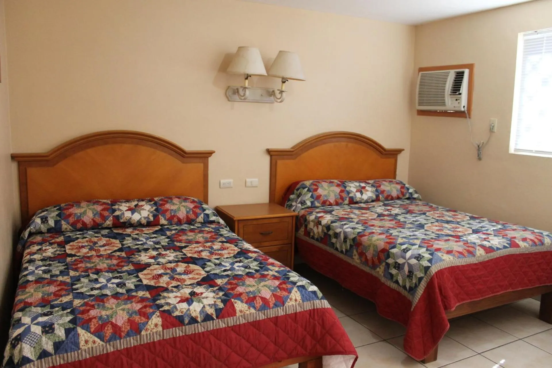 Bed in El Ejecutivo Aparthotel