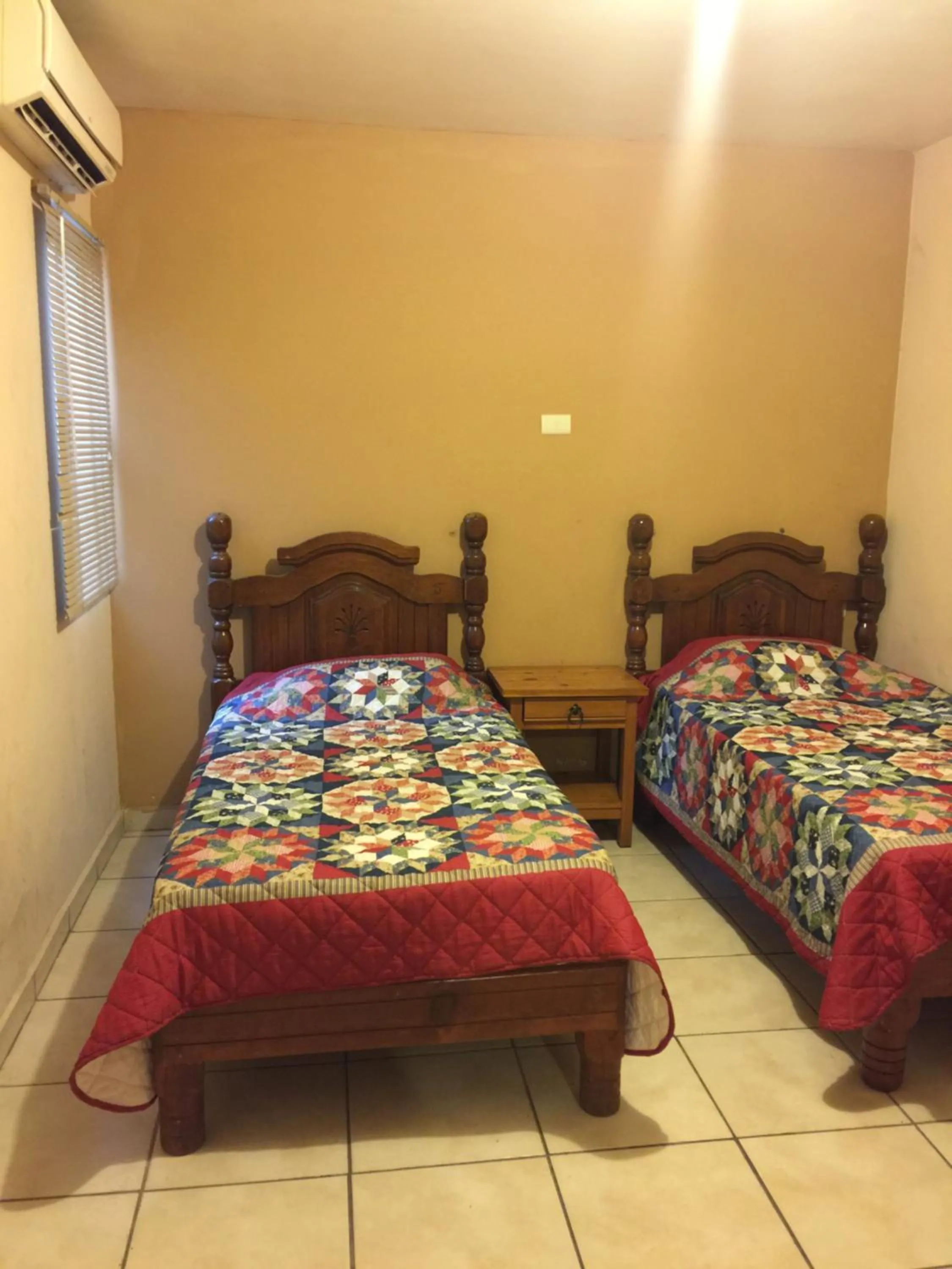 Bed in El Ejecutivo Aparthotel