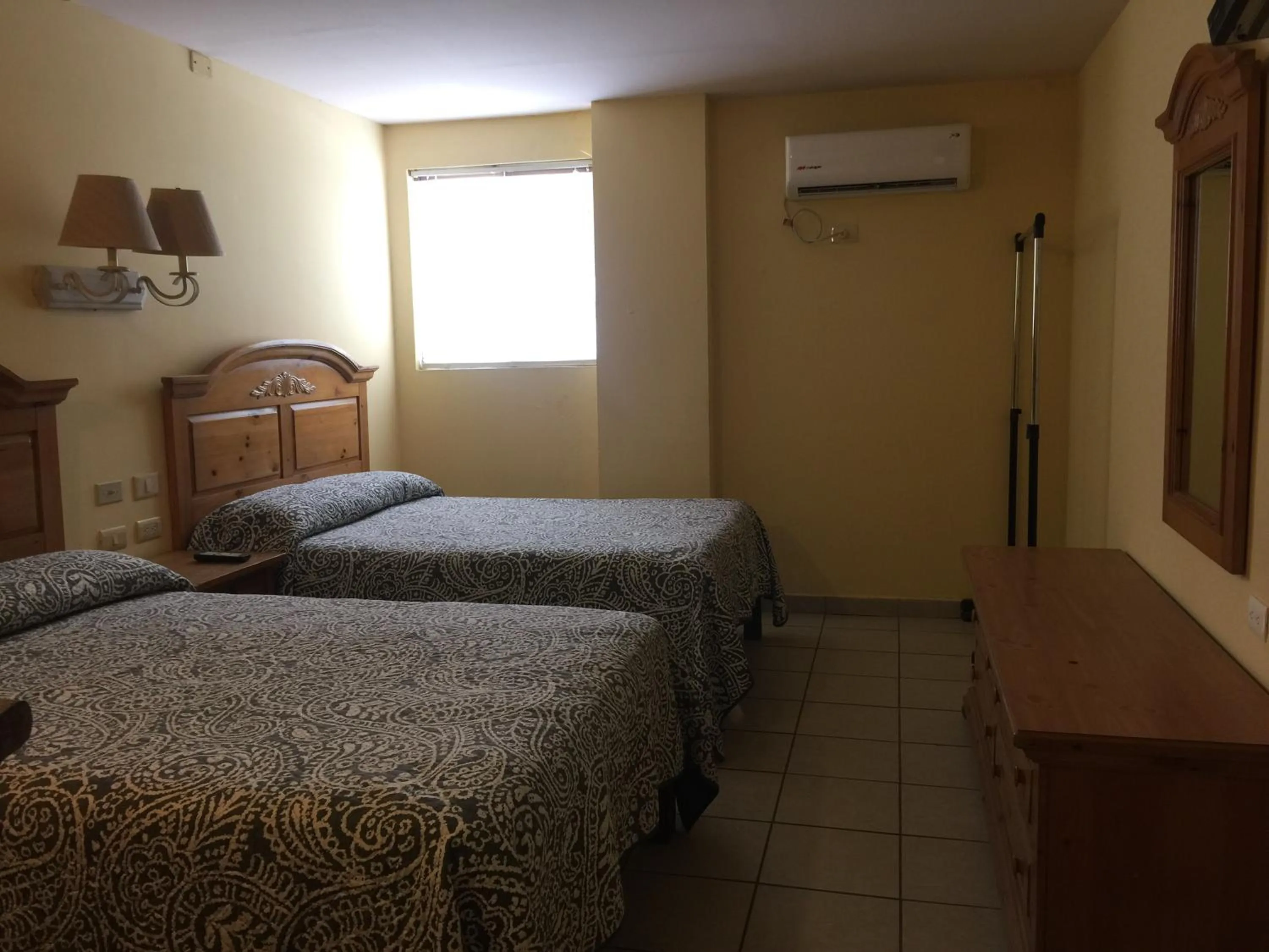 Bed in El Ejecutivo Aparthotel