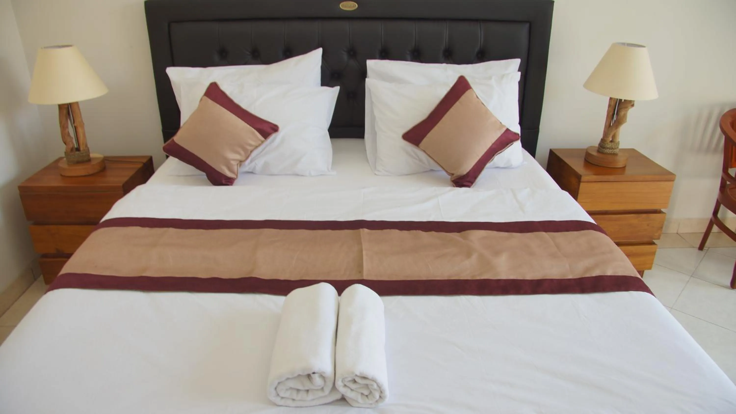 Bed in Surya Guest House Sanur