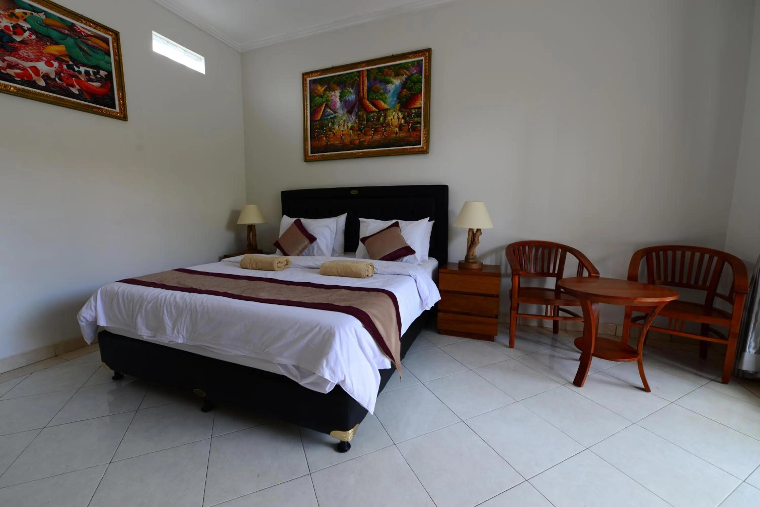 Bed in Surya Guest House Sanur