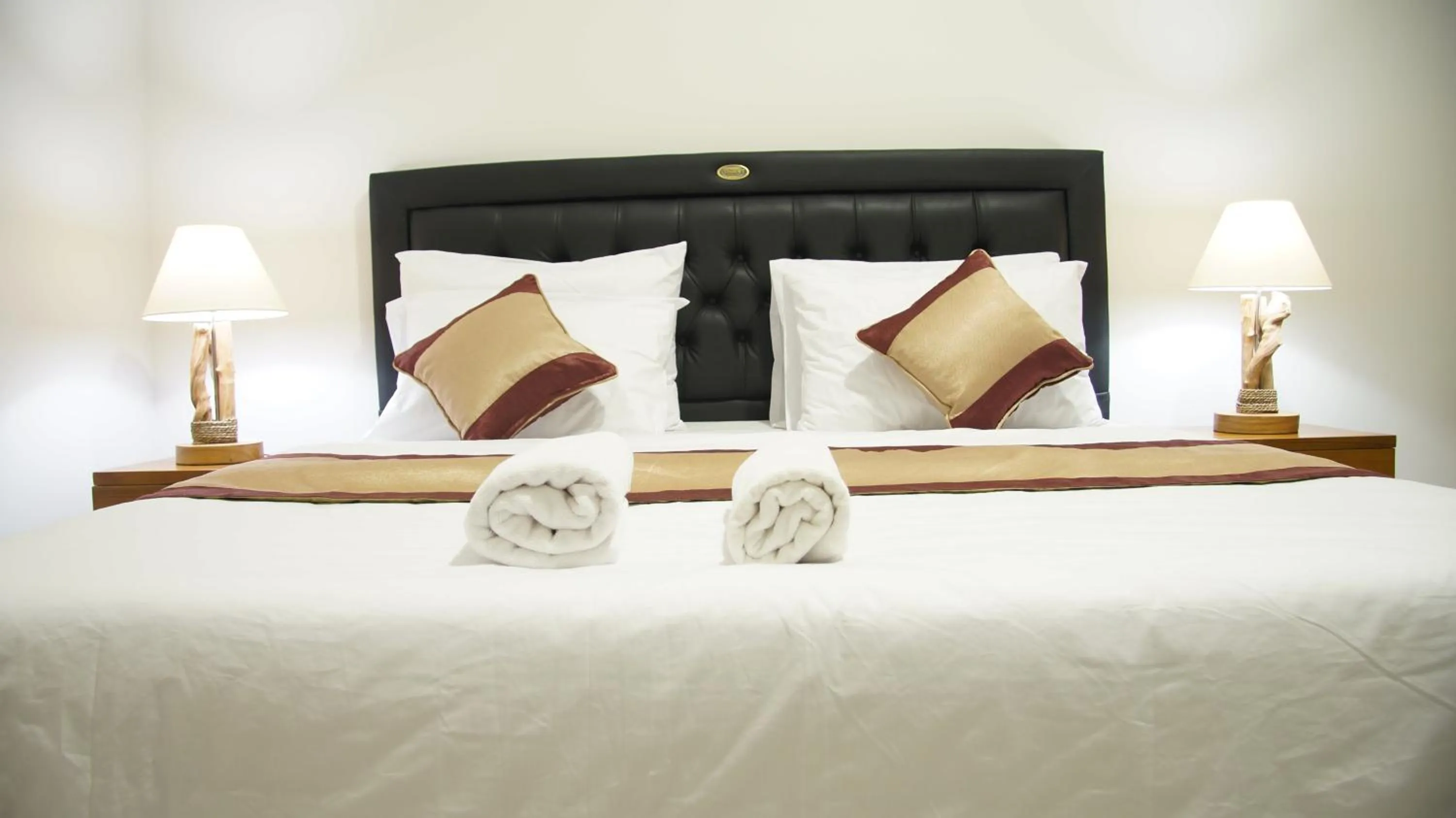 Bed in Surya Guest House Sanur