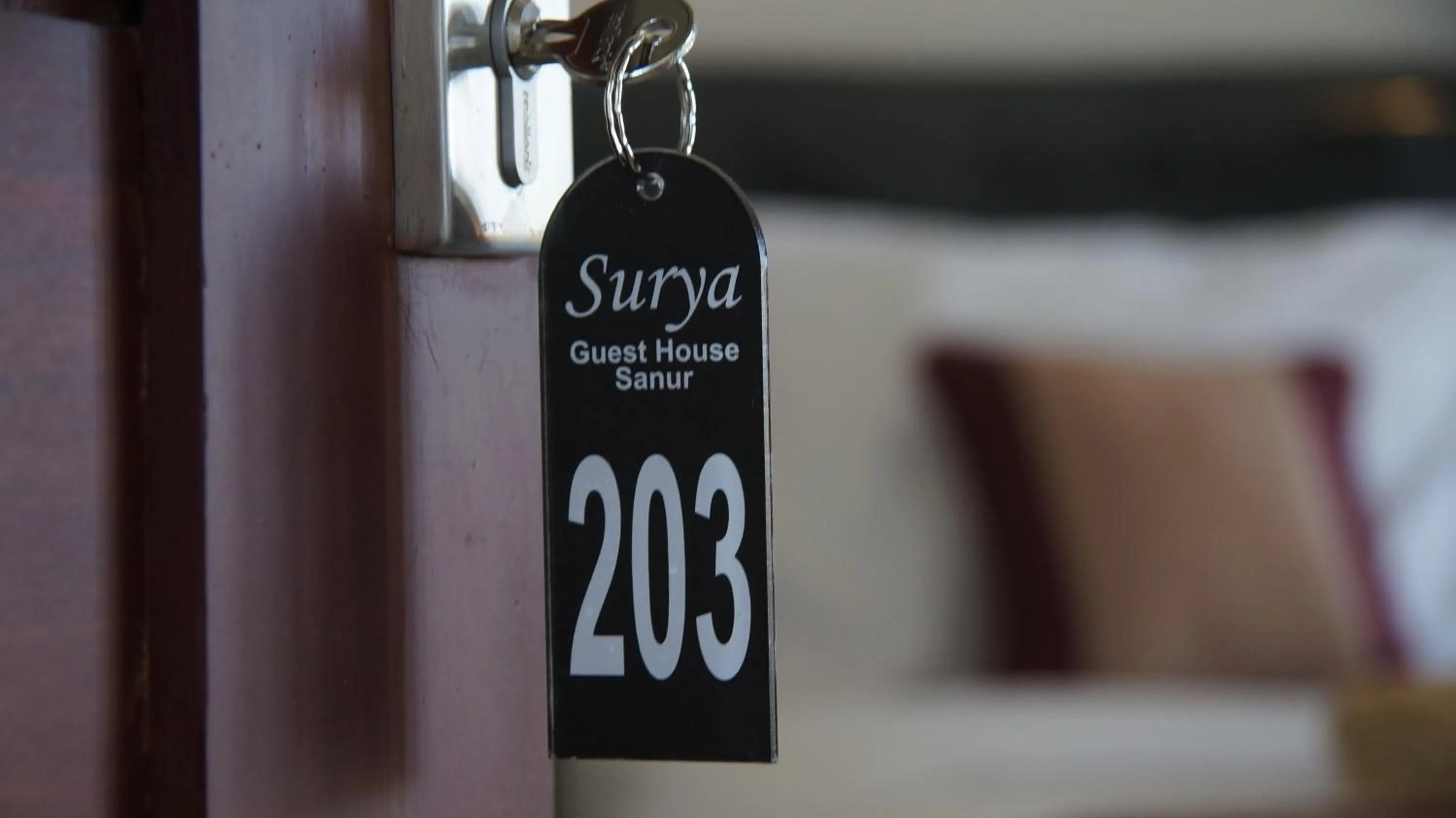Bed in Surya Guest House Sanur