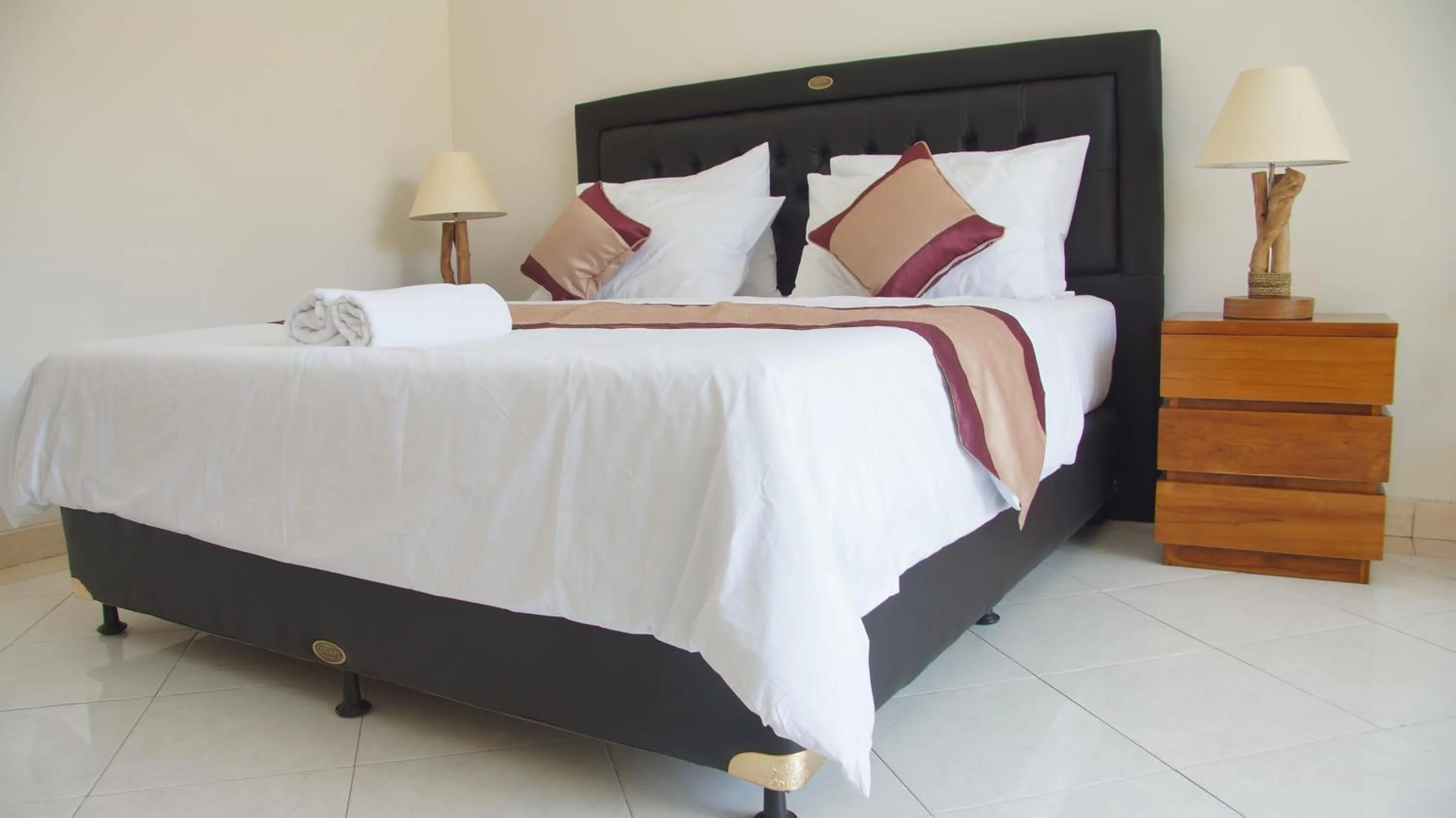 Bed in Surya Guest House Sanur