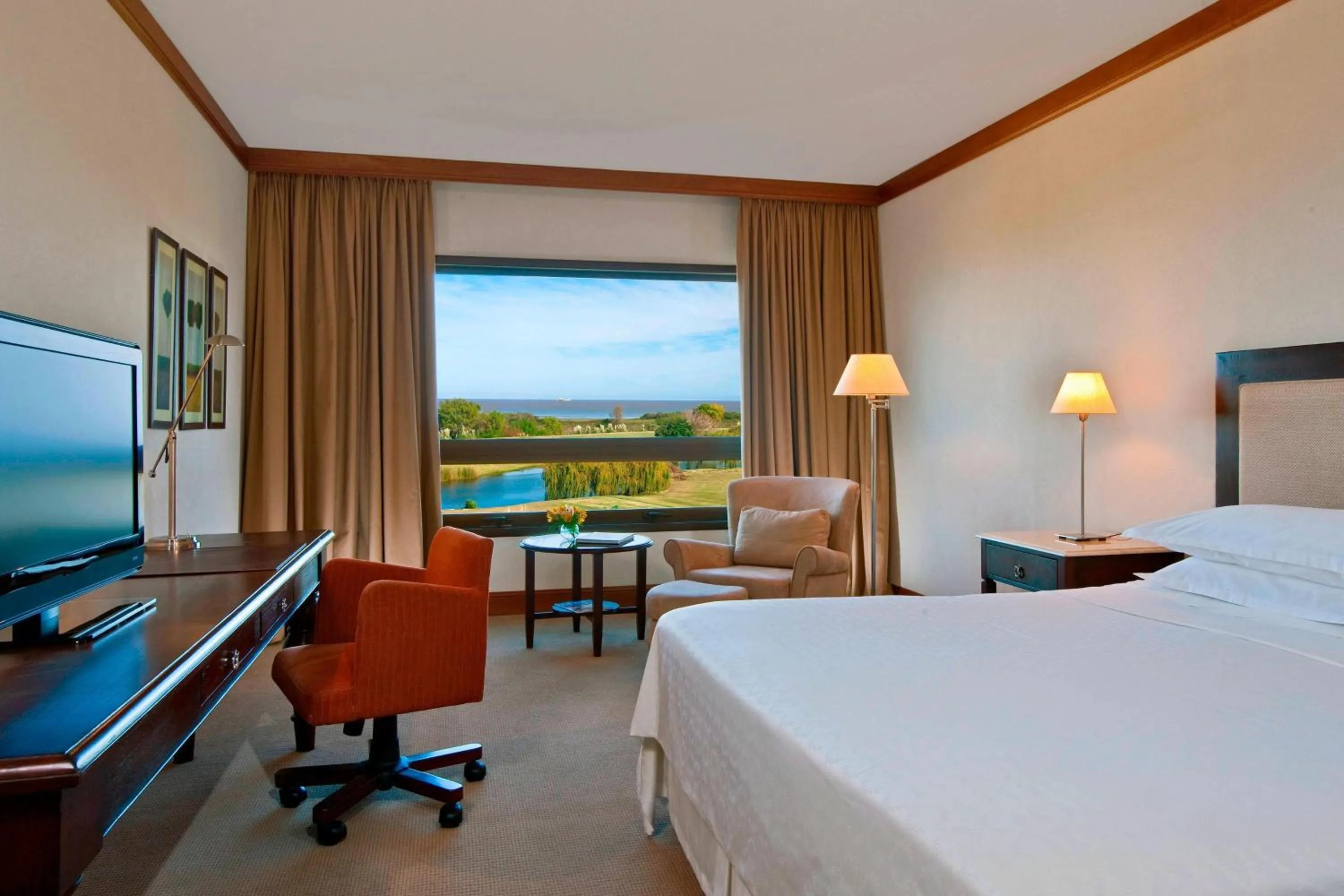 Photo of the whole room, Bed in Sheraton Colonia Golf & Spa Resort