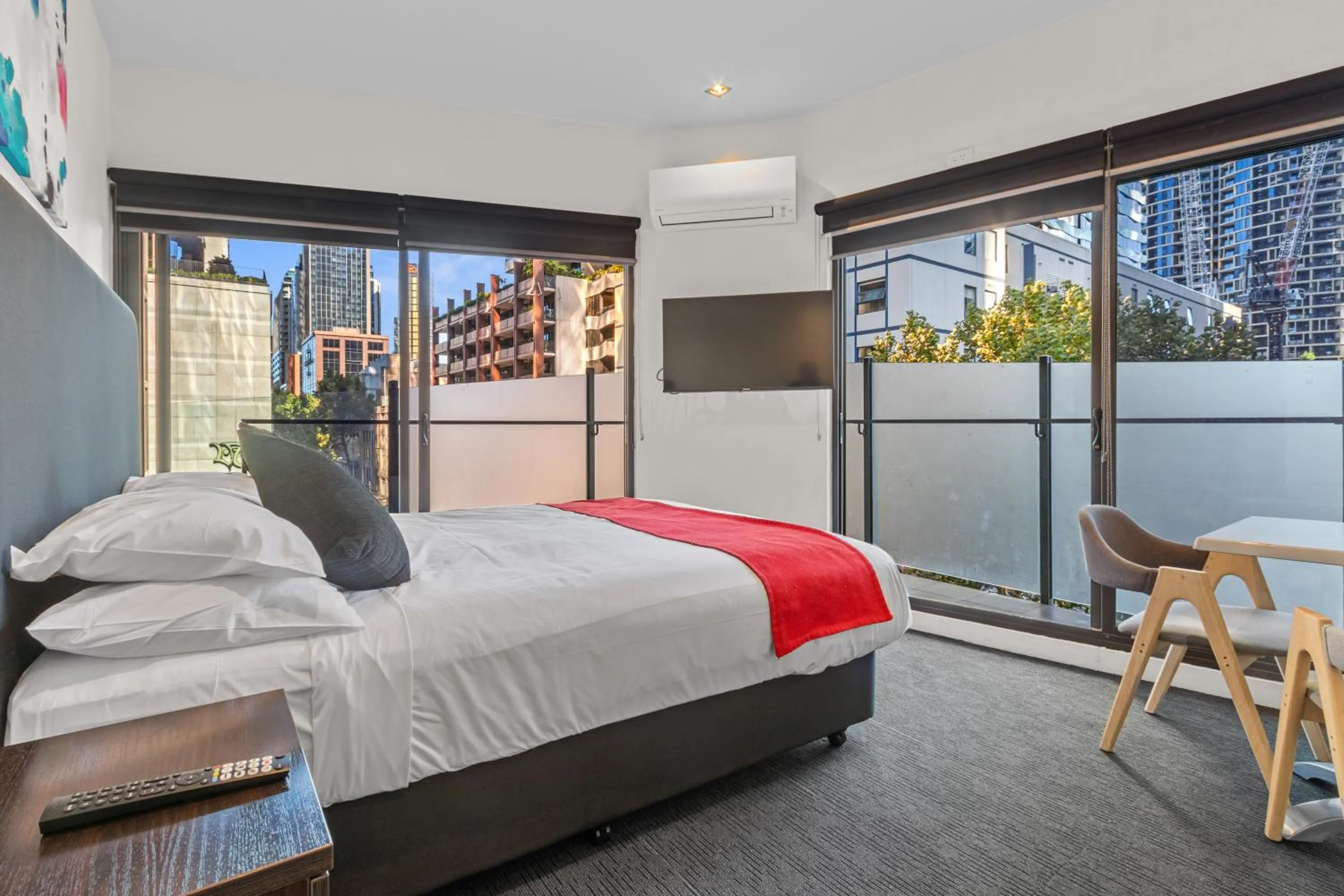 Bed in Comfort Apartments on Elizabeth