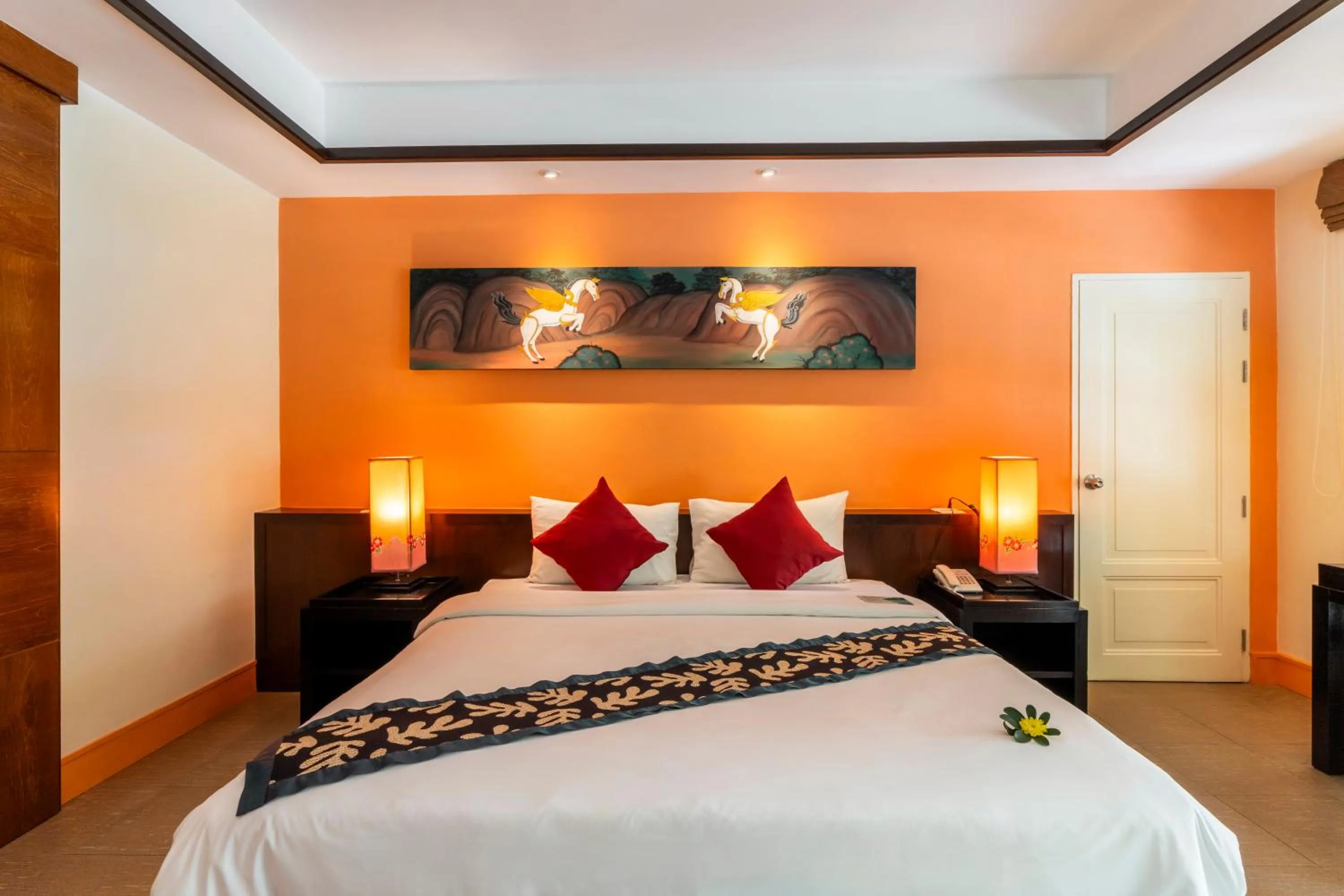 Bed in Baan Khaolak Beach Resort