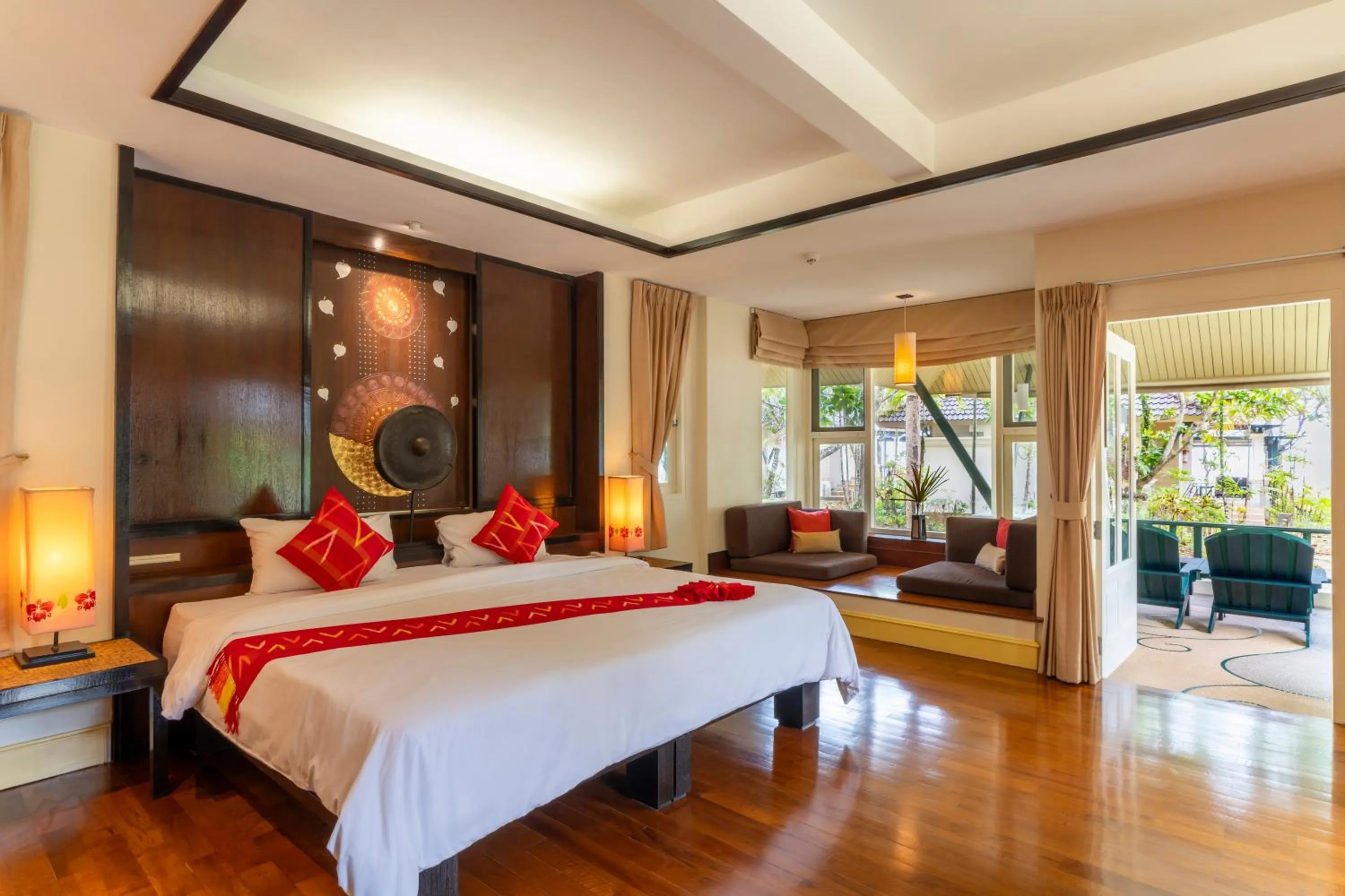 Bed in Baan Khaolak Beach Resort