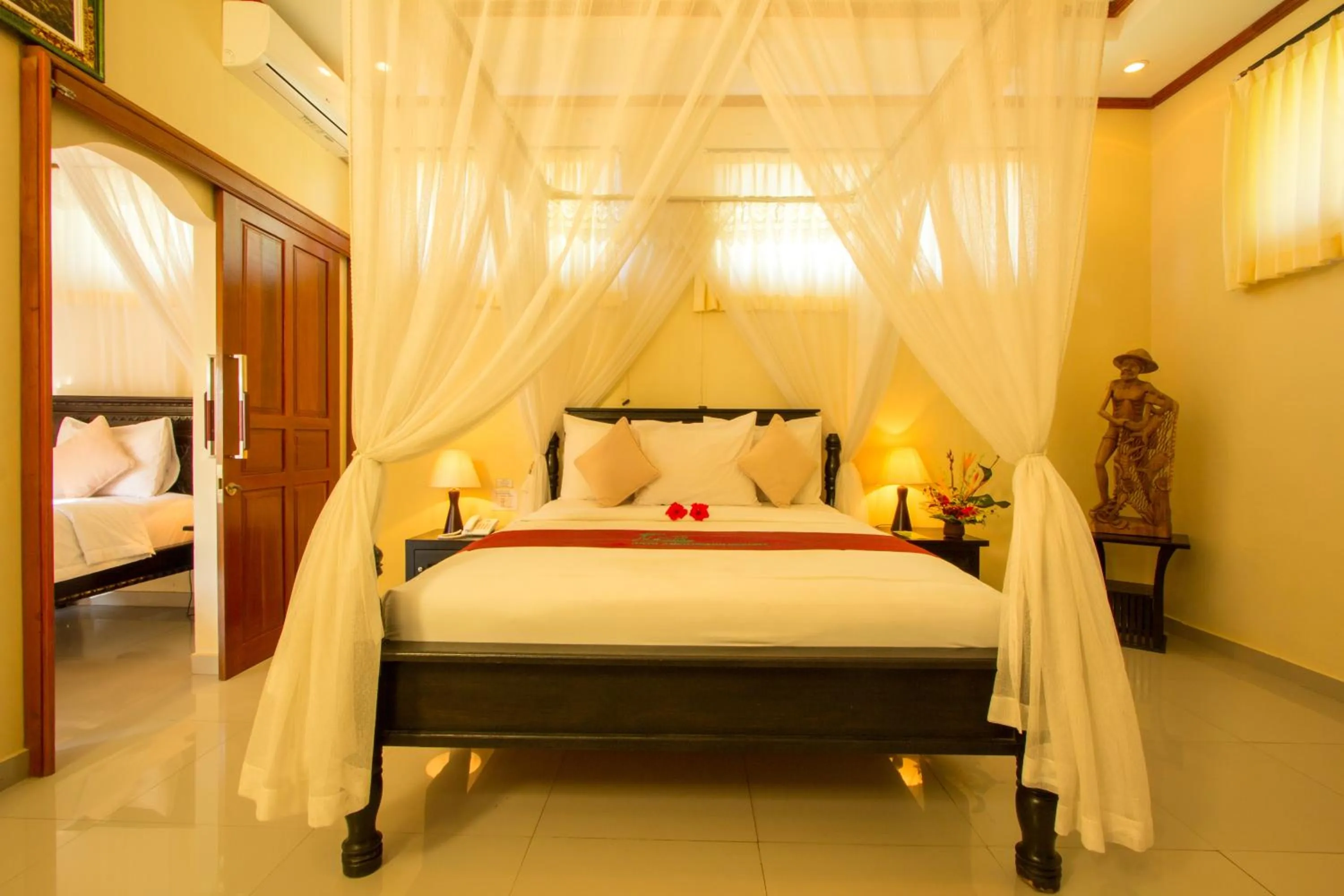 TV and multimedia, Bed in Arya Amed Beach Resort and Dive Center