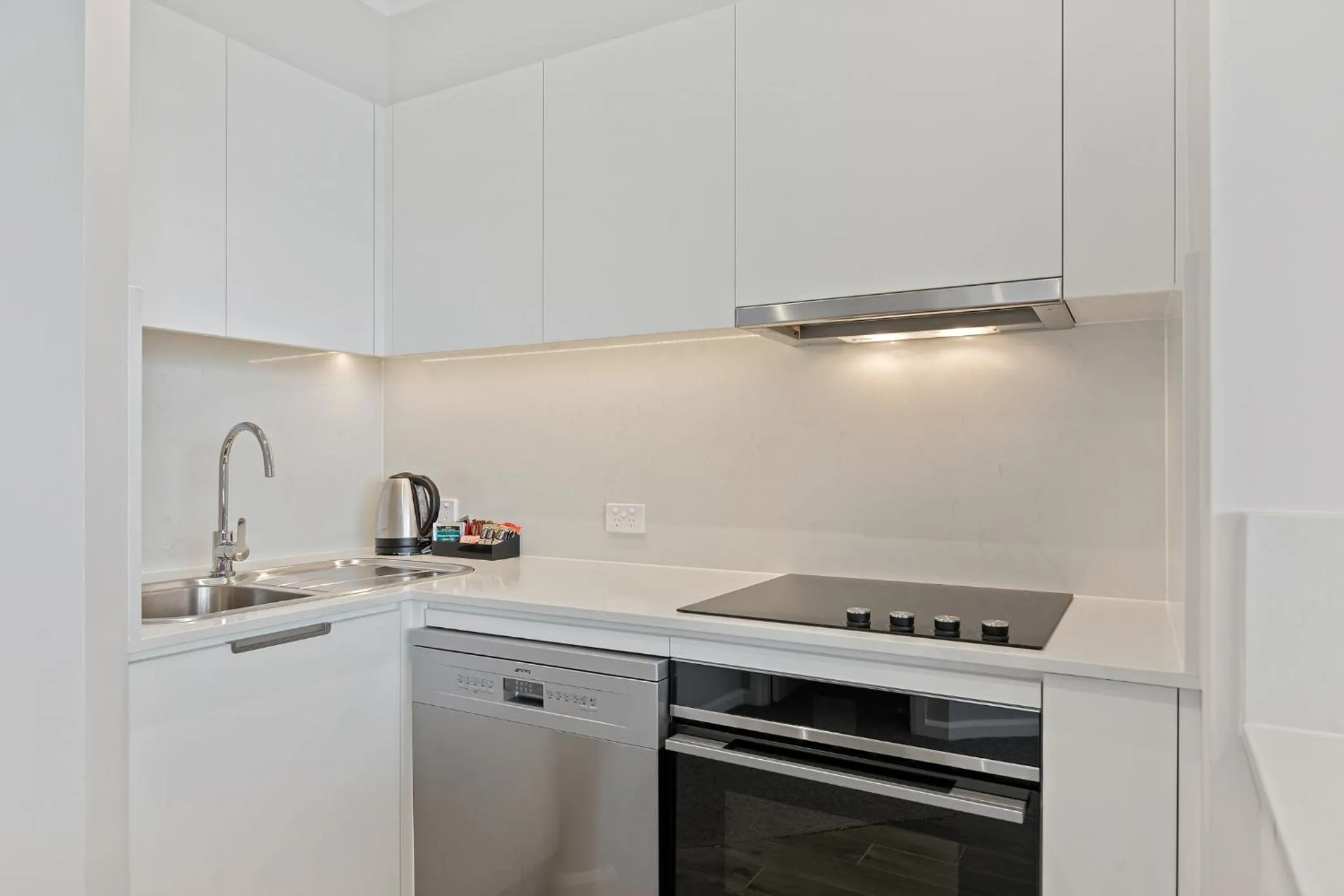 Kitchen or kitchenette in The Sebel Quay West Suites Sydney