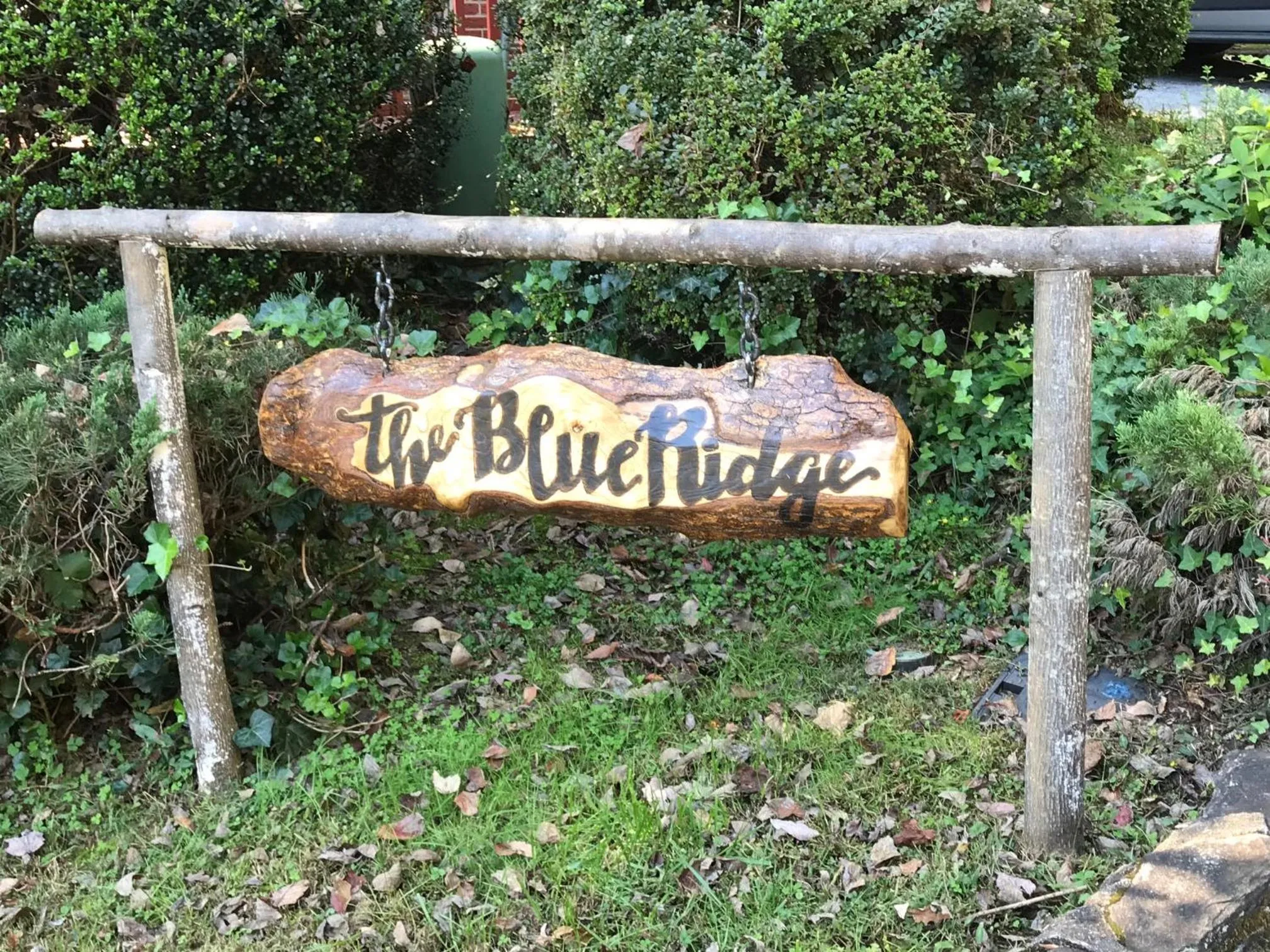 Logo/Certificate/Sign in Mountain Aire Cottages, Inn, & Glamping