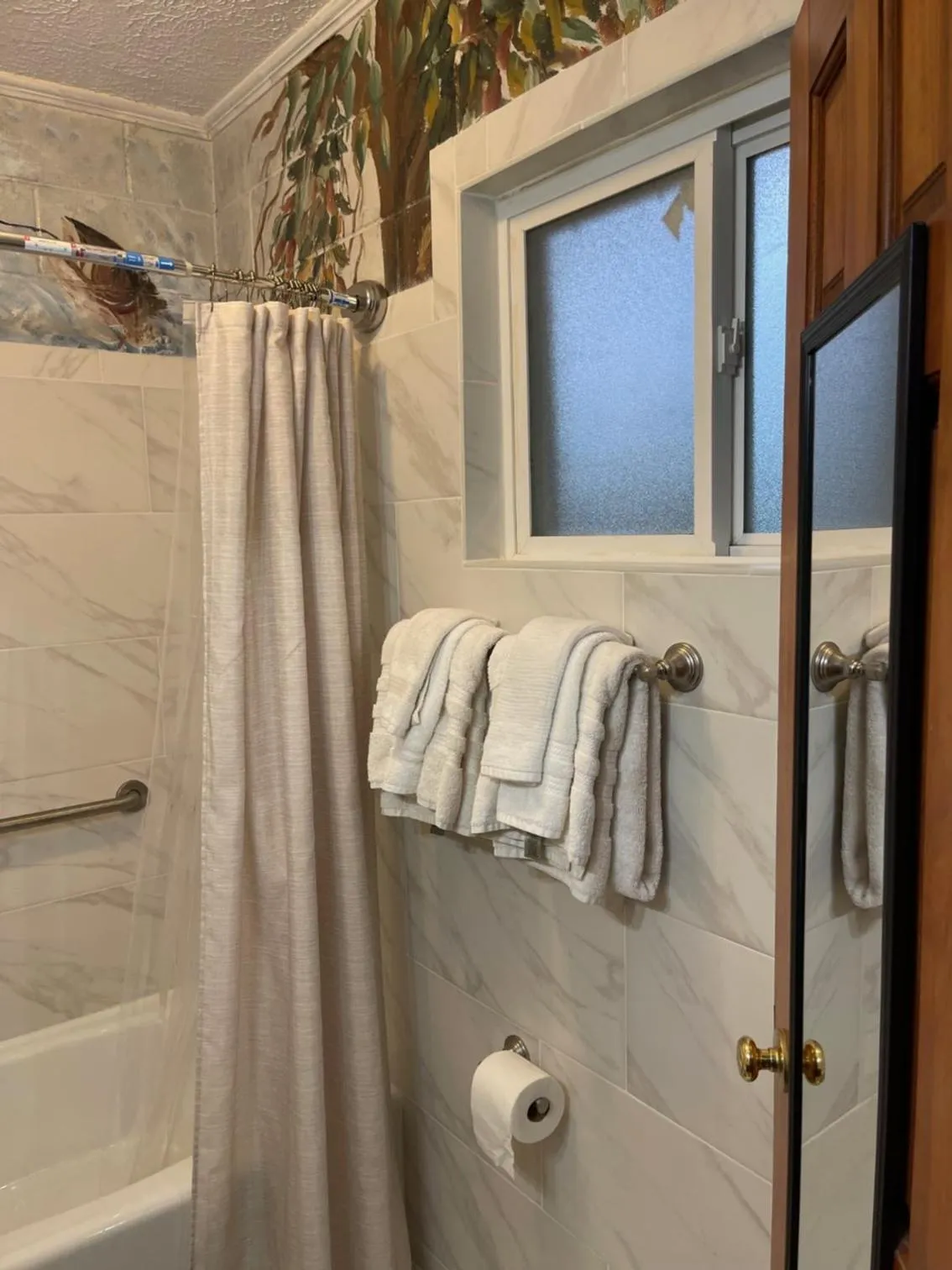 Shower in Mountain Aire Cottages, Inn, & Glamping