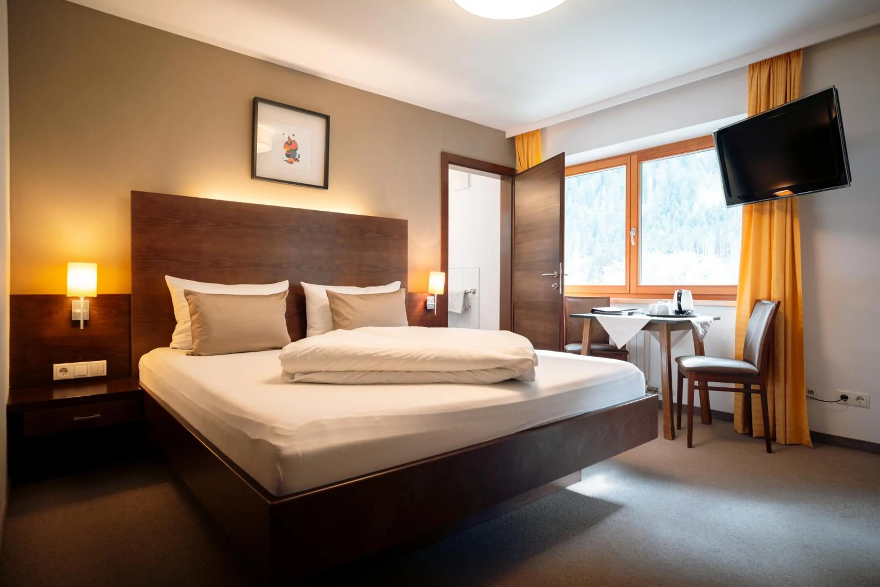 TV and multimedia, Bed in Apart-Garni Innerwiesn