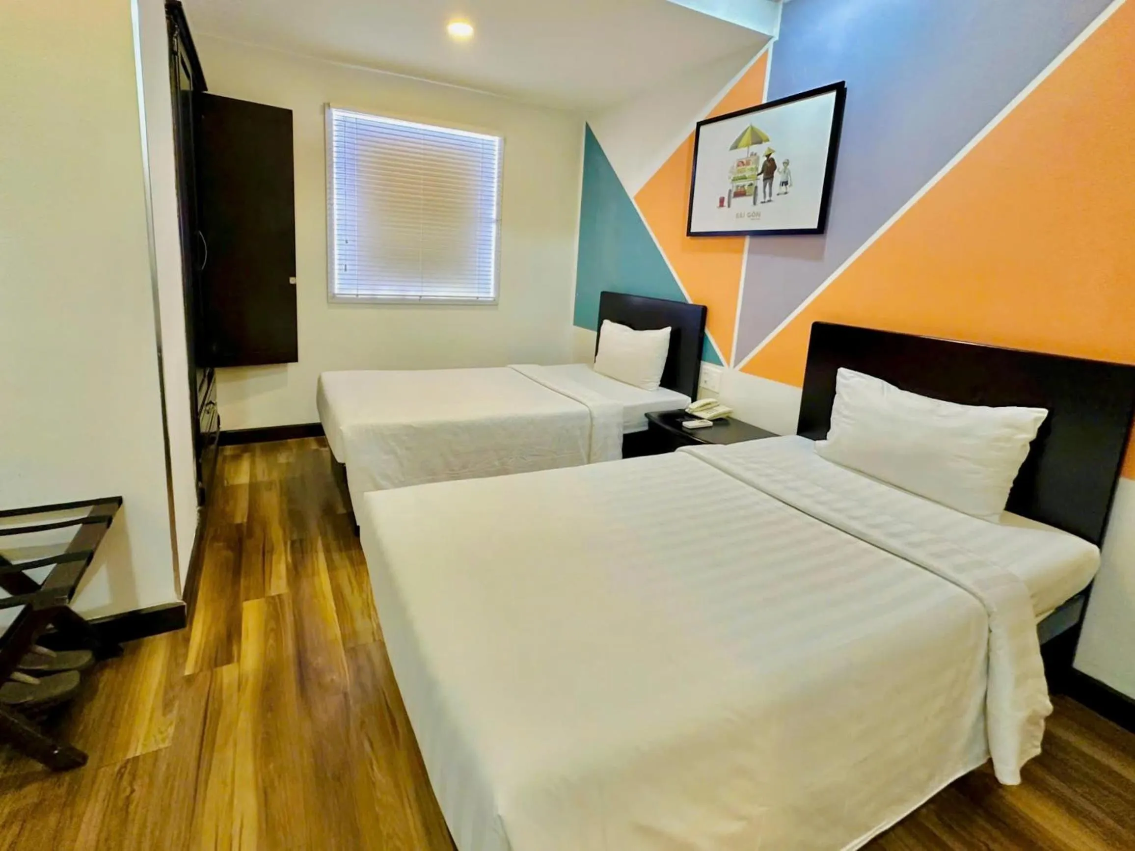 Bed in Sunrise Central Hotel