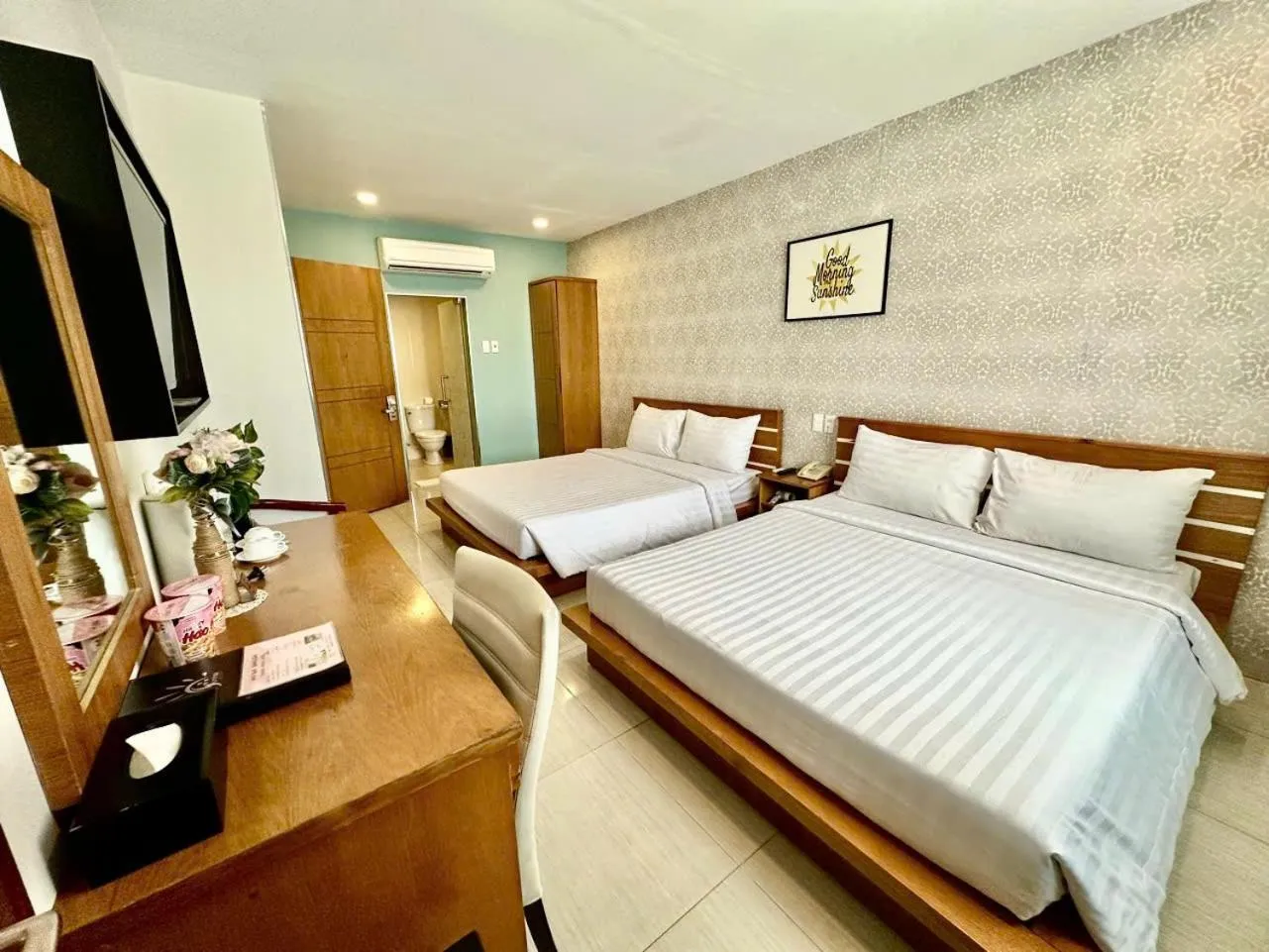 Bed in Sunrise Central Hotel