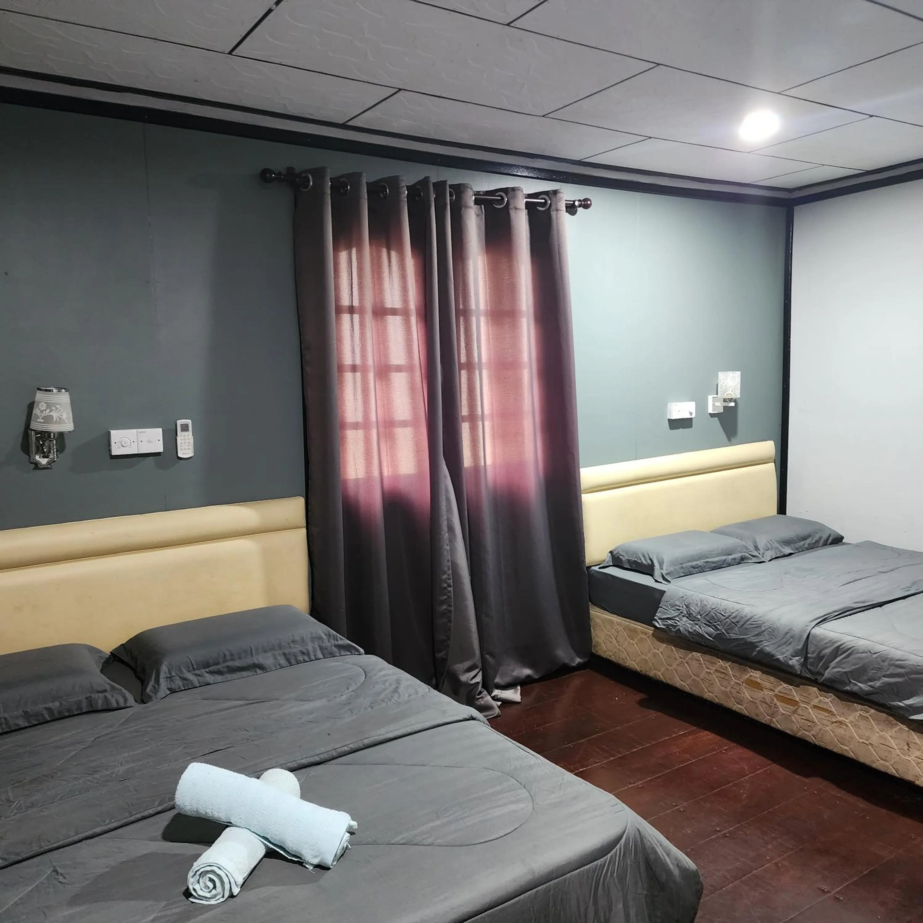 Bed in Permai Chalet Tioman