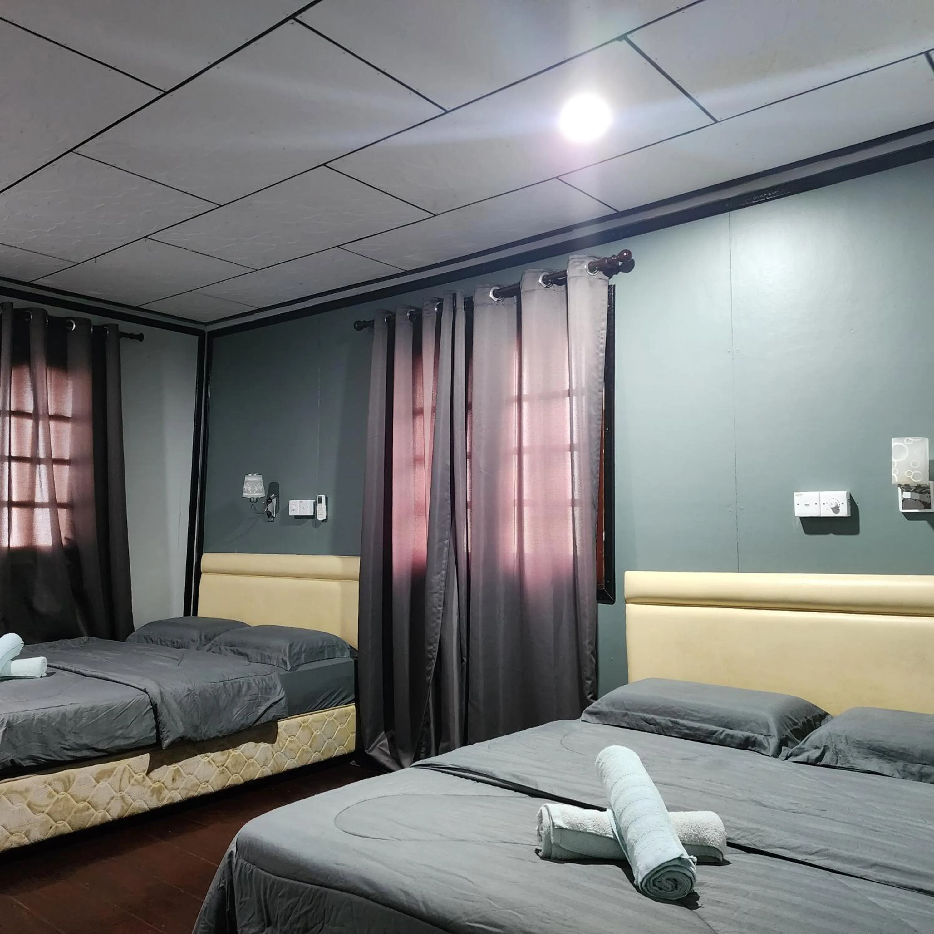 Bed in Permai Chalet Tioman