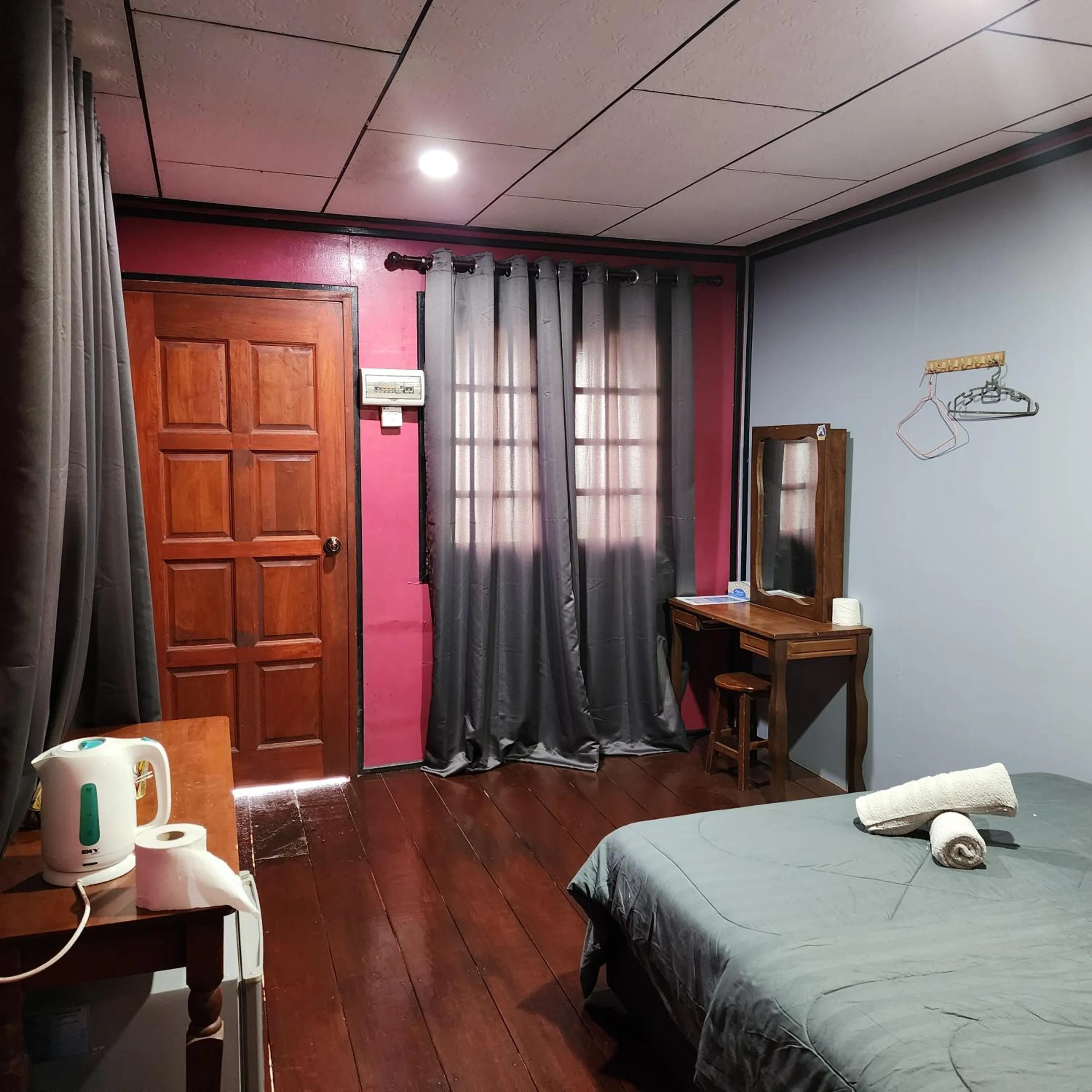 Bed in Permai Chalet Tioman