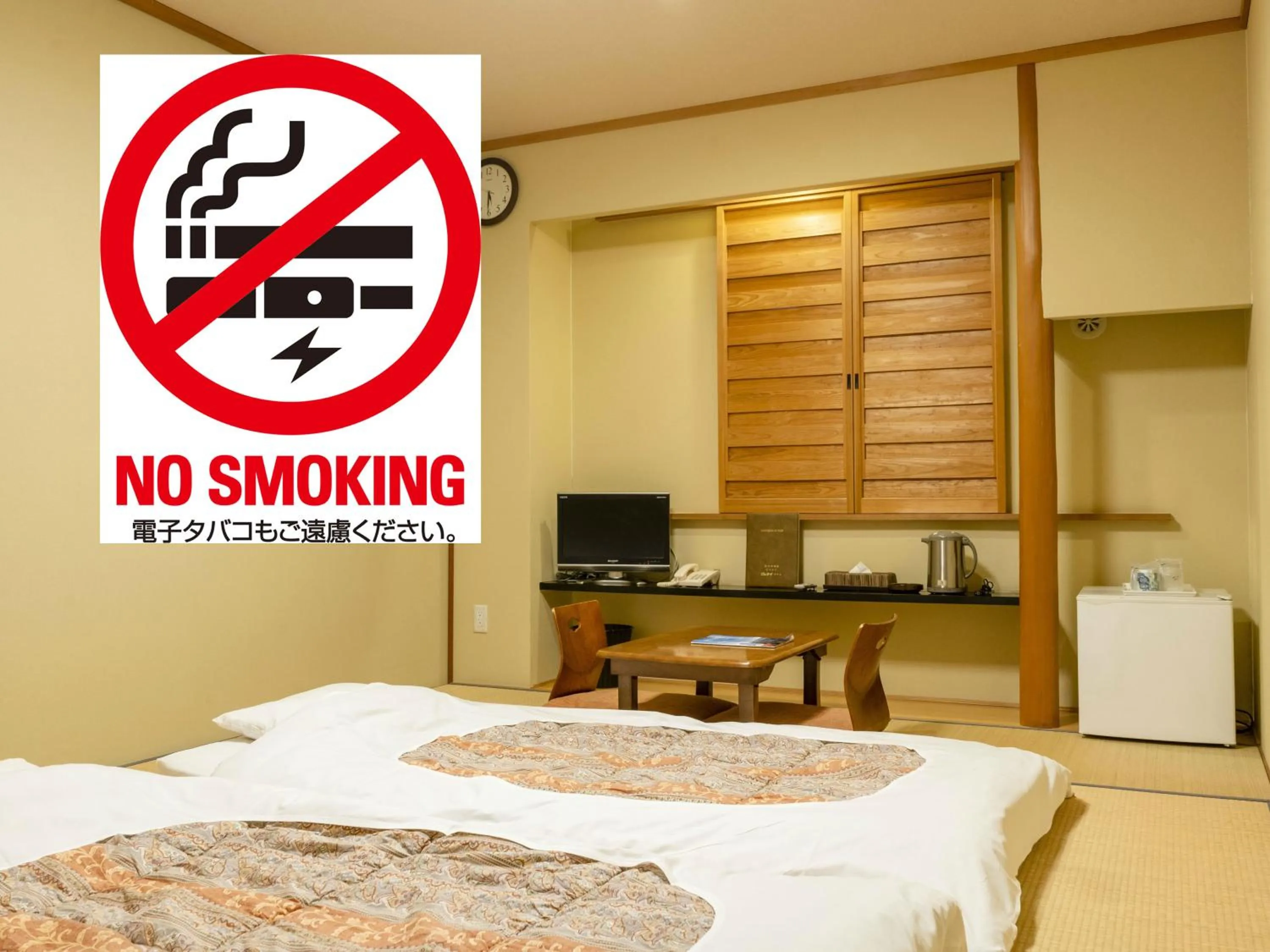 Bed in Kumamoto Ichibamae Business Kurenai Hotel