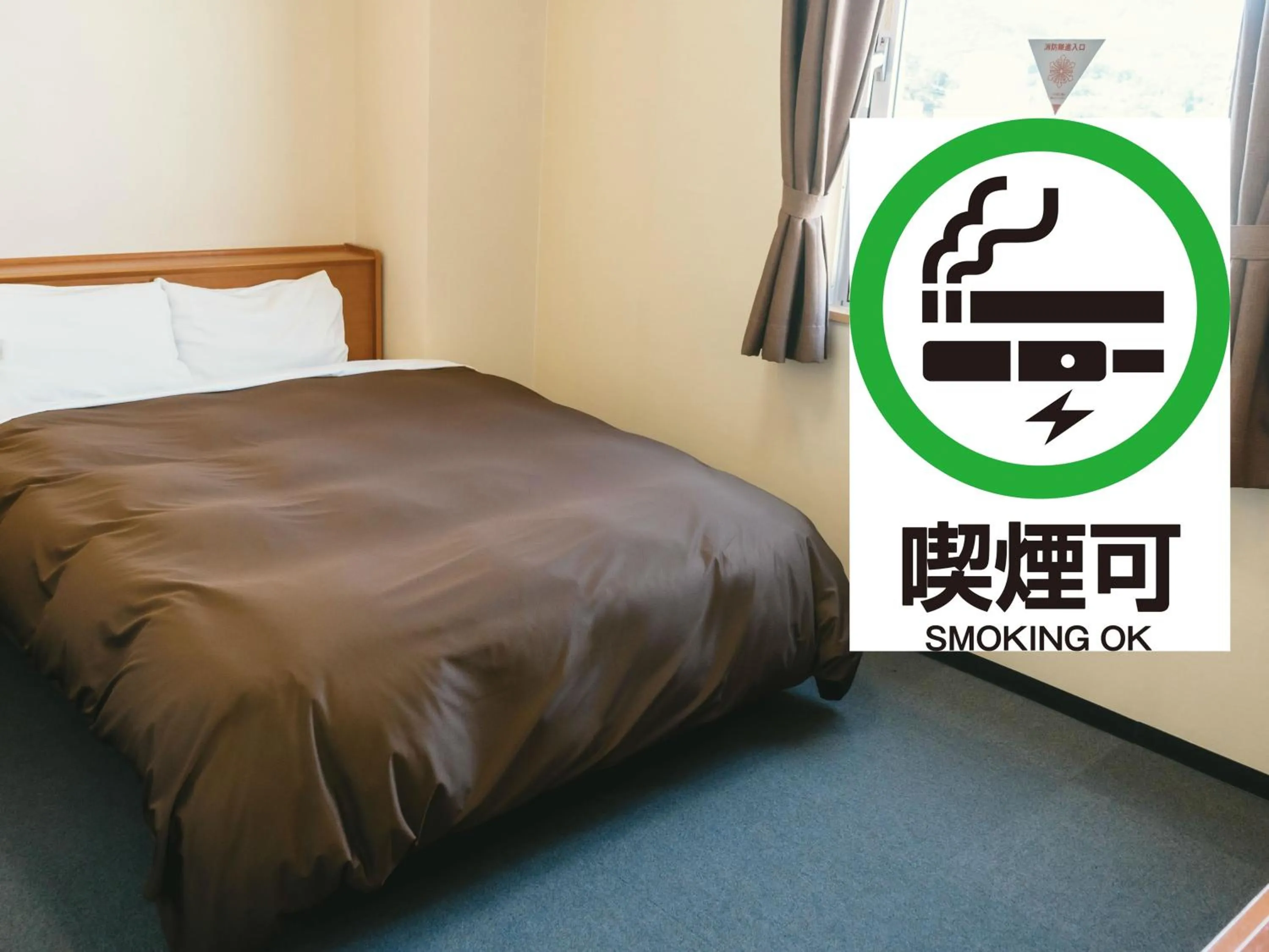 Bed in Kumamoto Ichibamae Business Kurenai Hotel