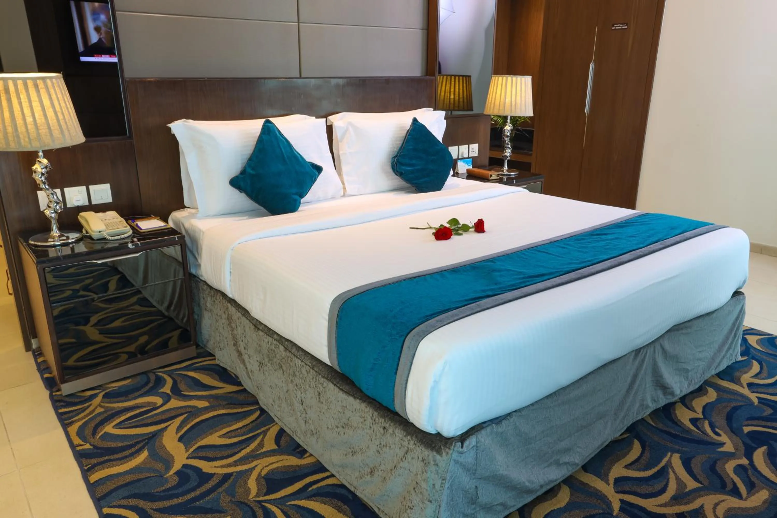 Bed in Omega Hotel Dubai