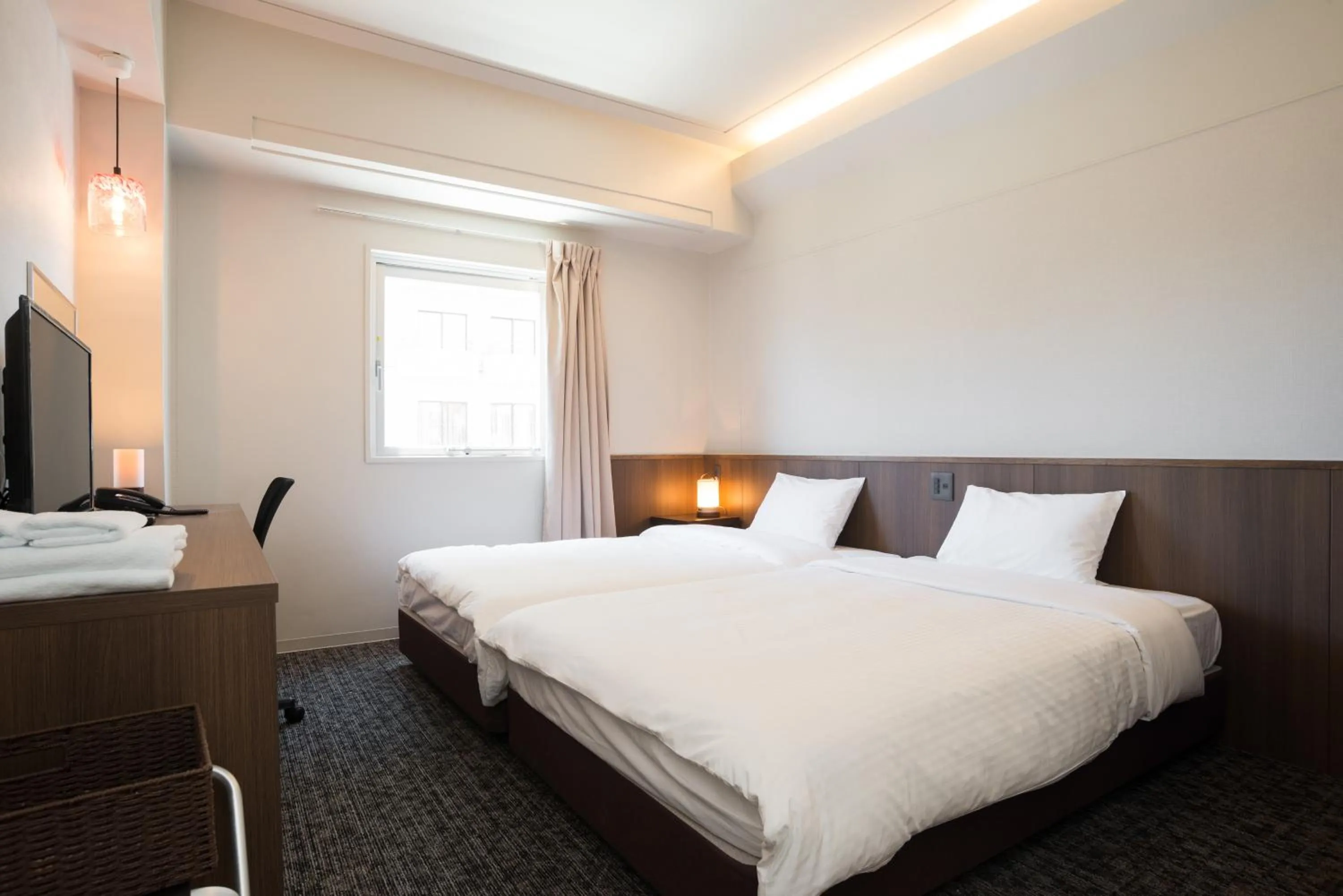 Photo of the whole room, Bed in RJ Hotel Naha