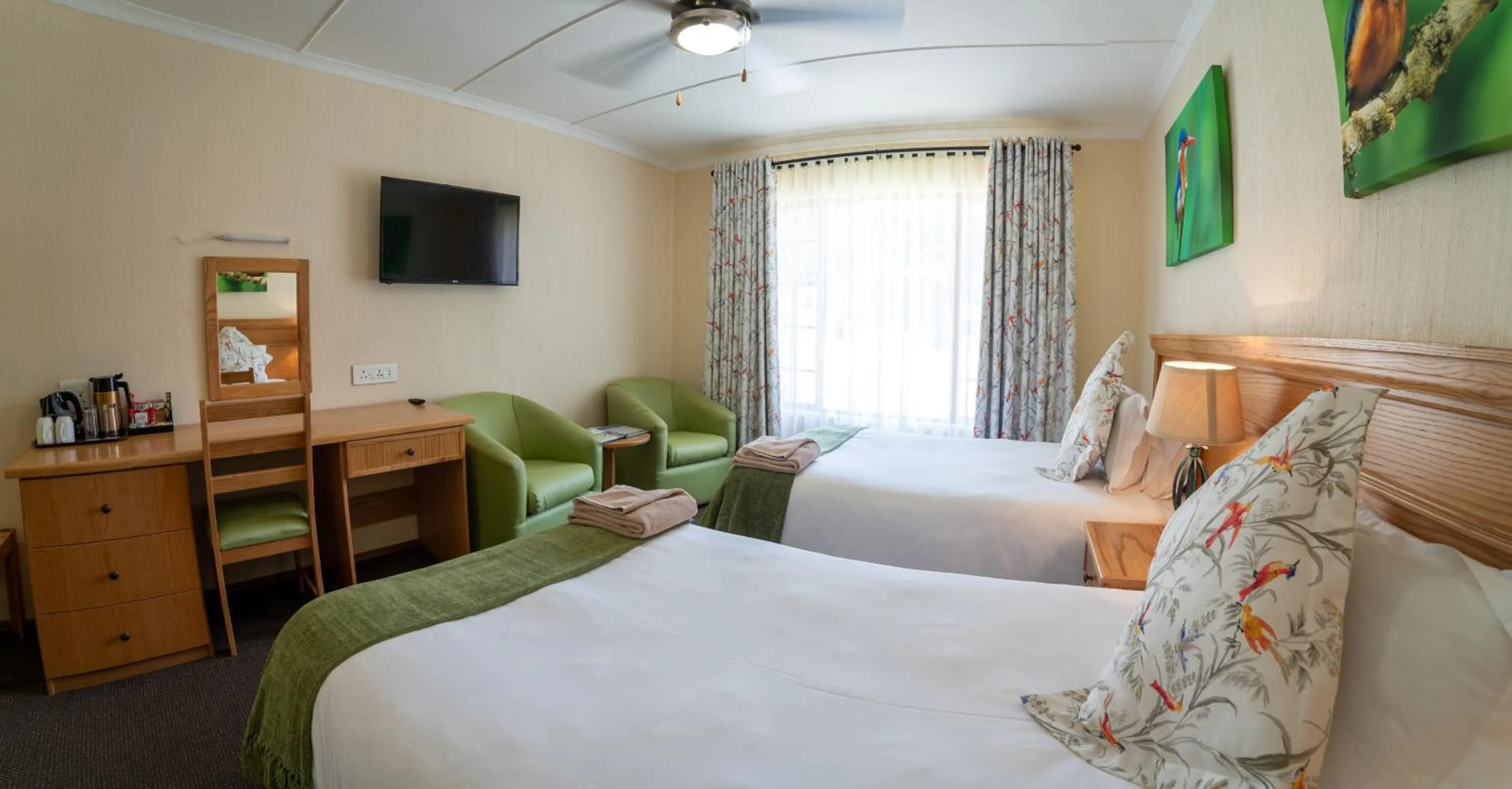 Photo of the whole room, Bed in Gooderson Drakensberg Gardens Golf & Spa Resort