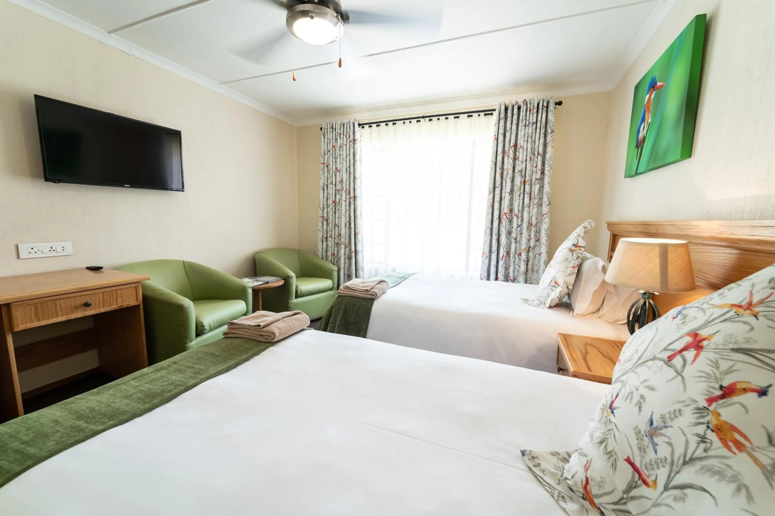 Photo of the whole room, Bed in Gooderson Drakensberg Gardens Golf & Spa Resort