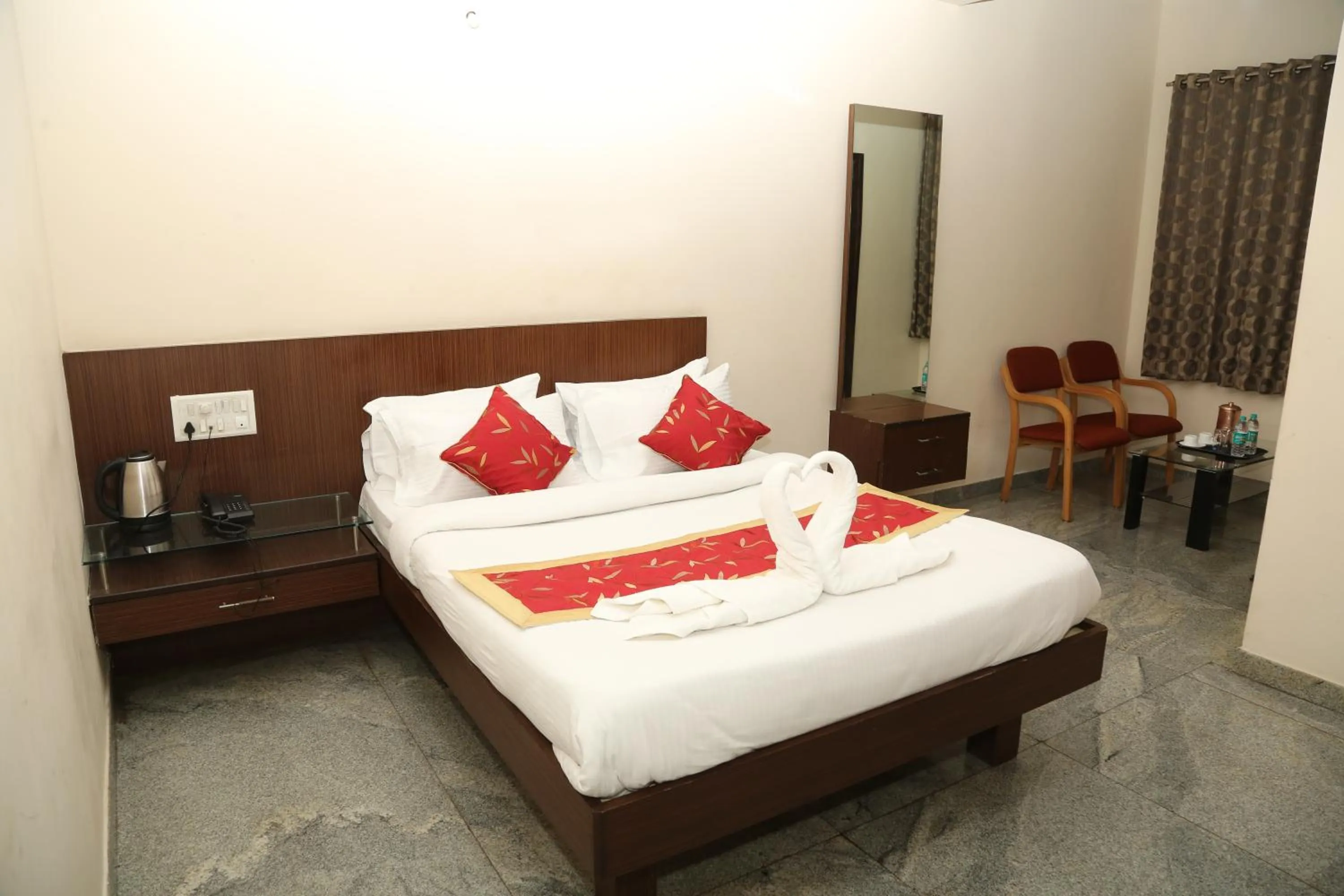 Bed in Soundarya Hotel