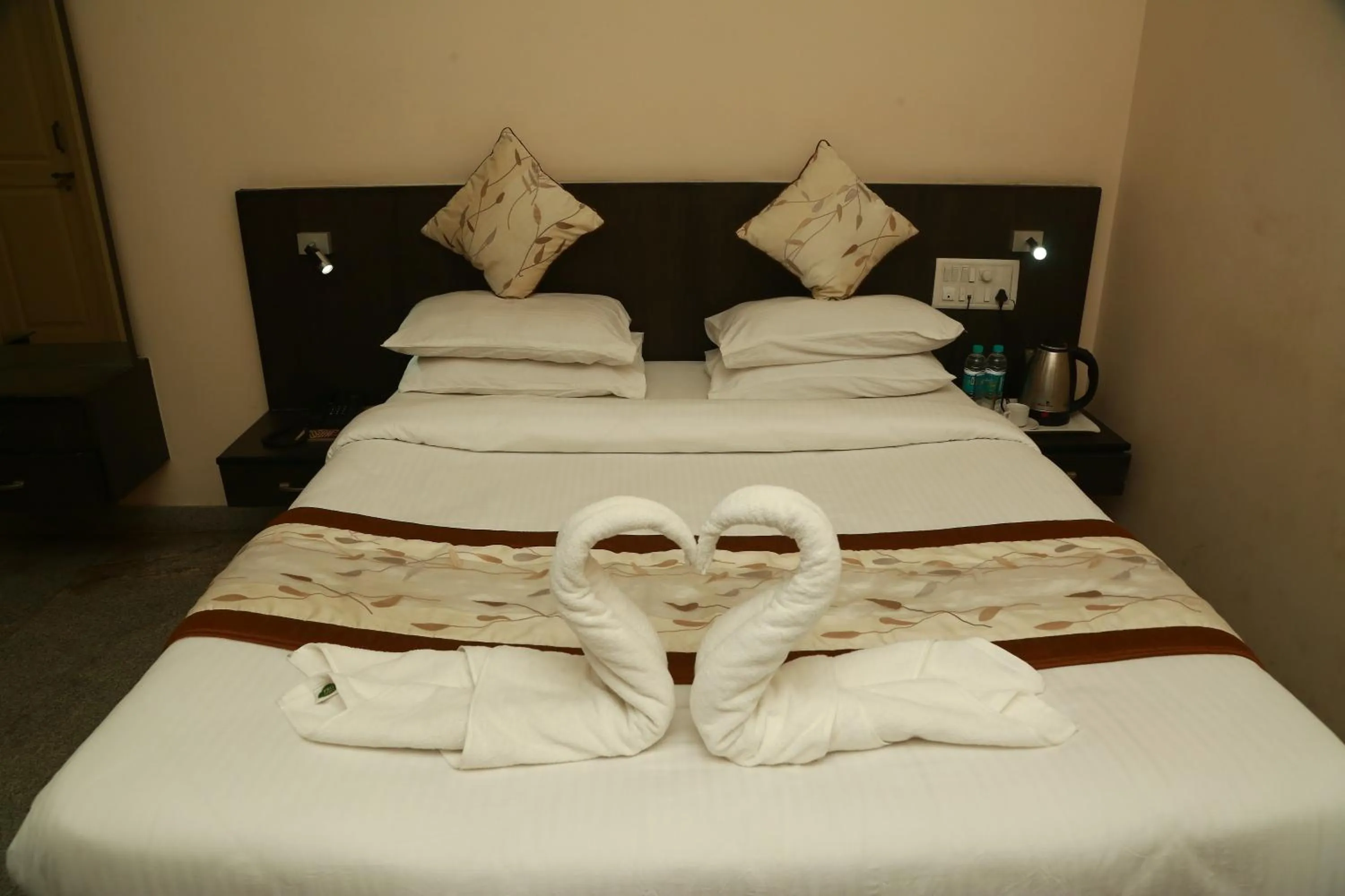 Bed in Soundarya Hotel