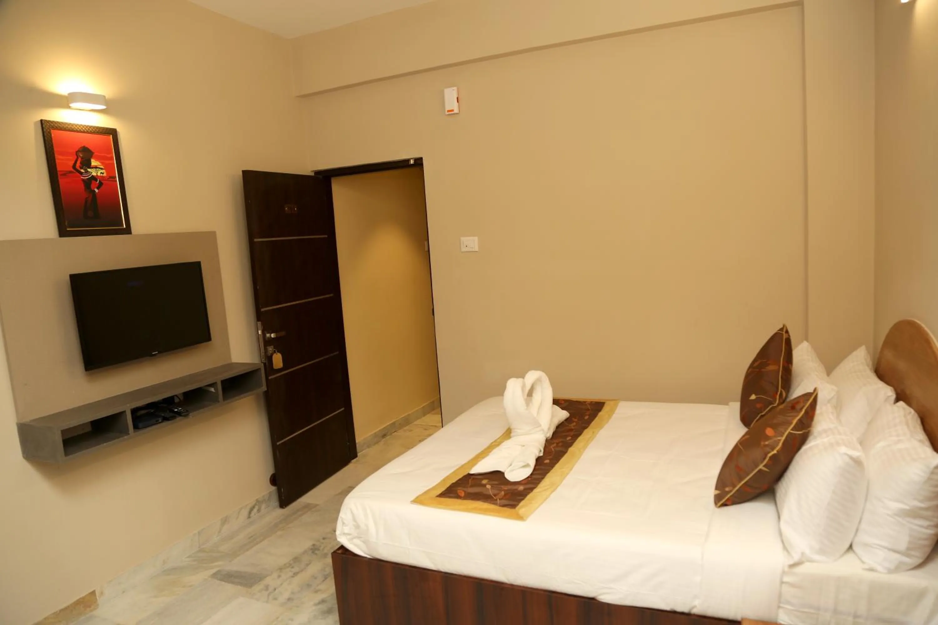Bed in Soundarya Hotel