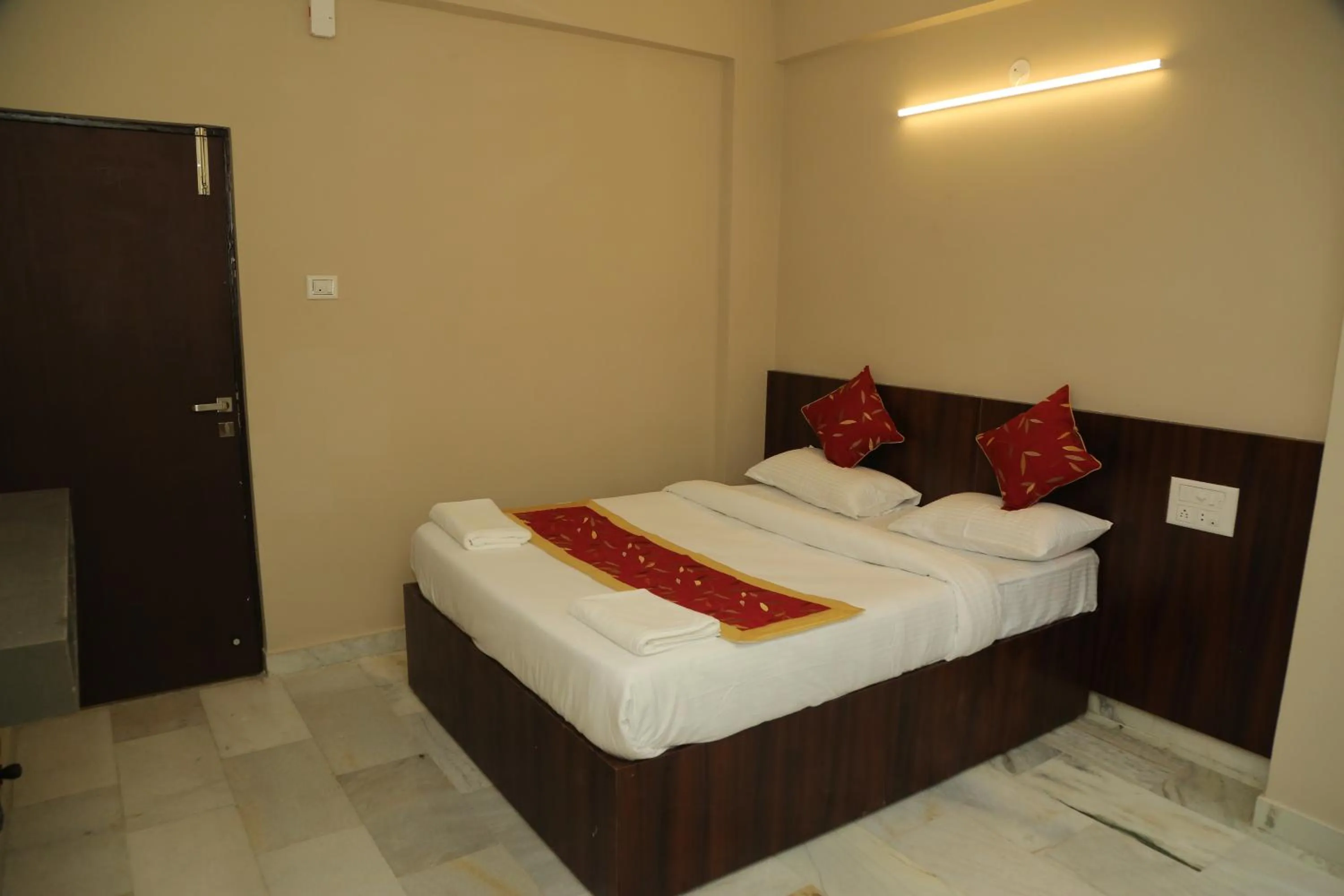 Bed in Soundarya Hotel